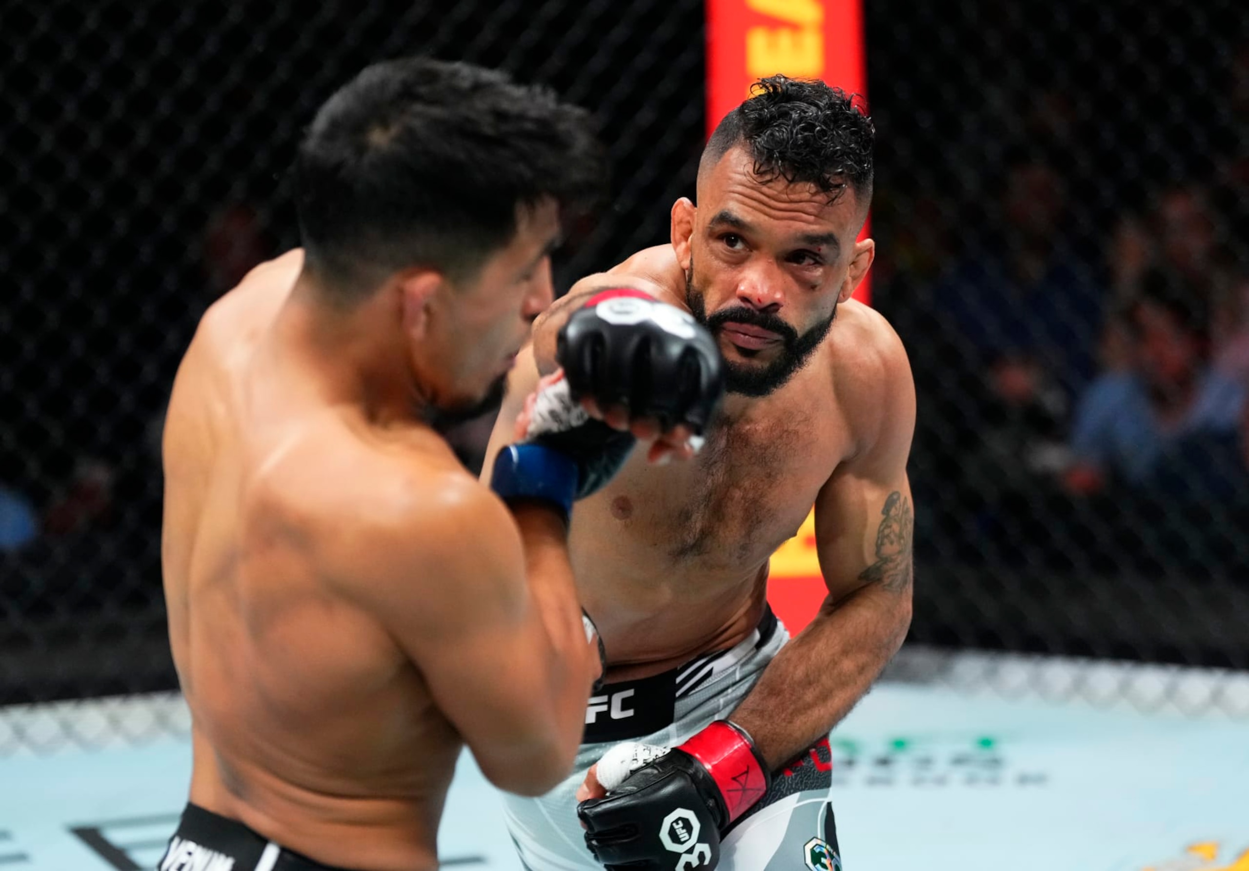 MIAMI, FLORIDA - APRIL 08: (R-L) Rob Font punches Adrian Yanez in a bantamweight fight during the UFC 287 event at Kaseya Center on April 08, 2023 in Miami, Florida. (Photo by Jeff Bottari/Zuffa LLC via Getty Images)