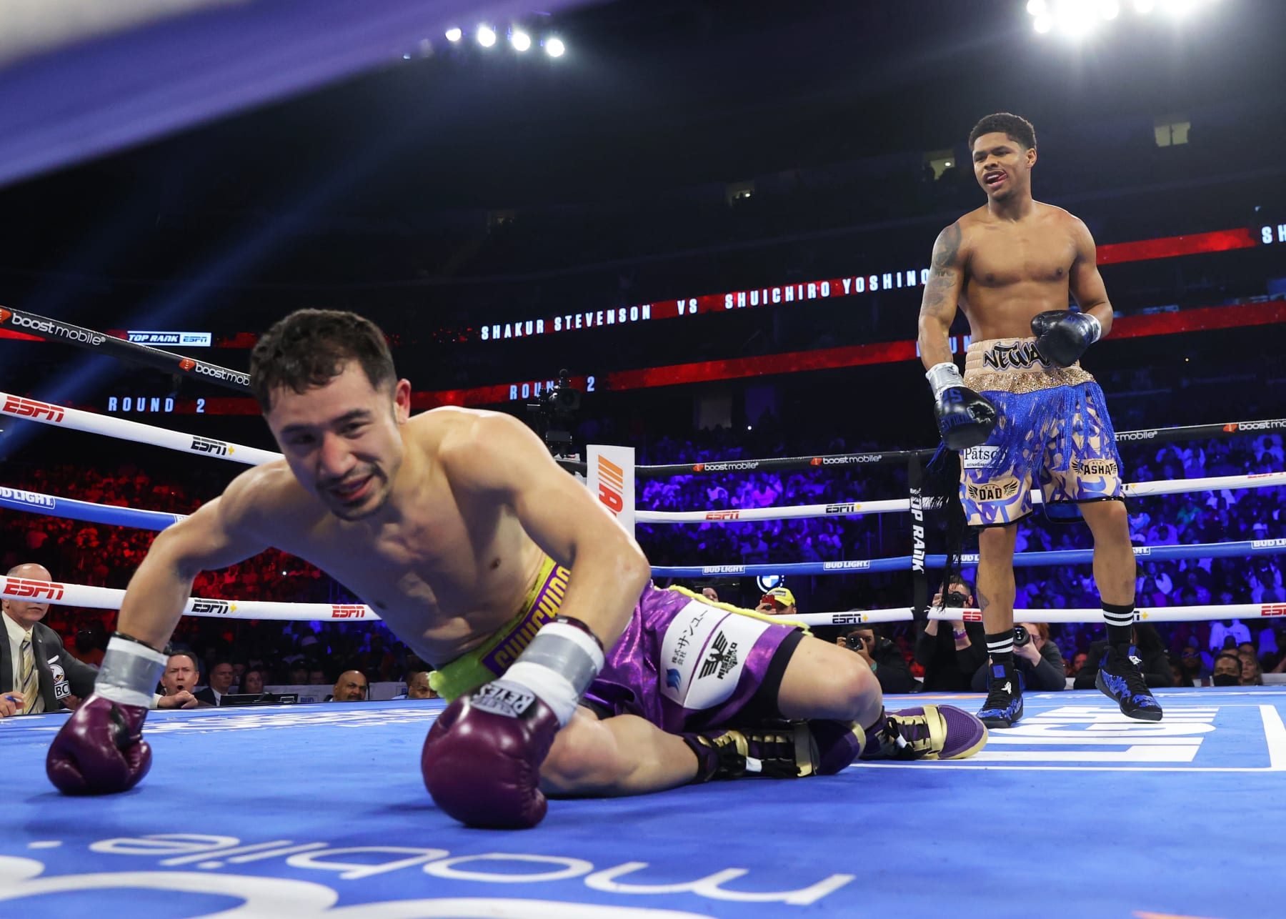 NEWARK, NEW JERSEY - APRIL 08: Shakur Stevenson (R) knocks-down Shuichiro Yoshino (L) during their lightweight fight at Prudential Center on April 08, 2023 in Newark, New Jersey. (Photo by Mikey Williams/Top Rank Inc via Getty Images)
