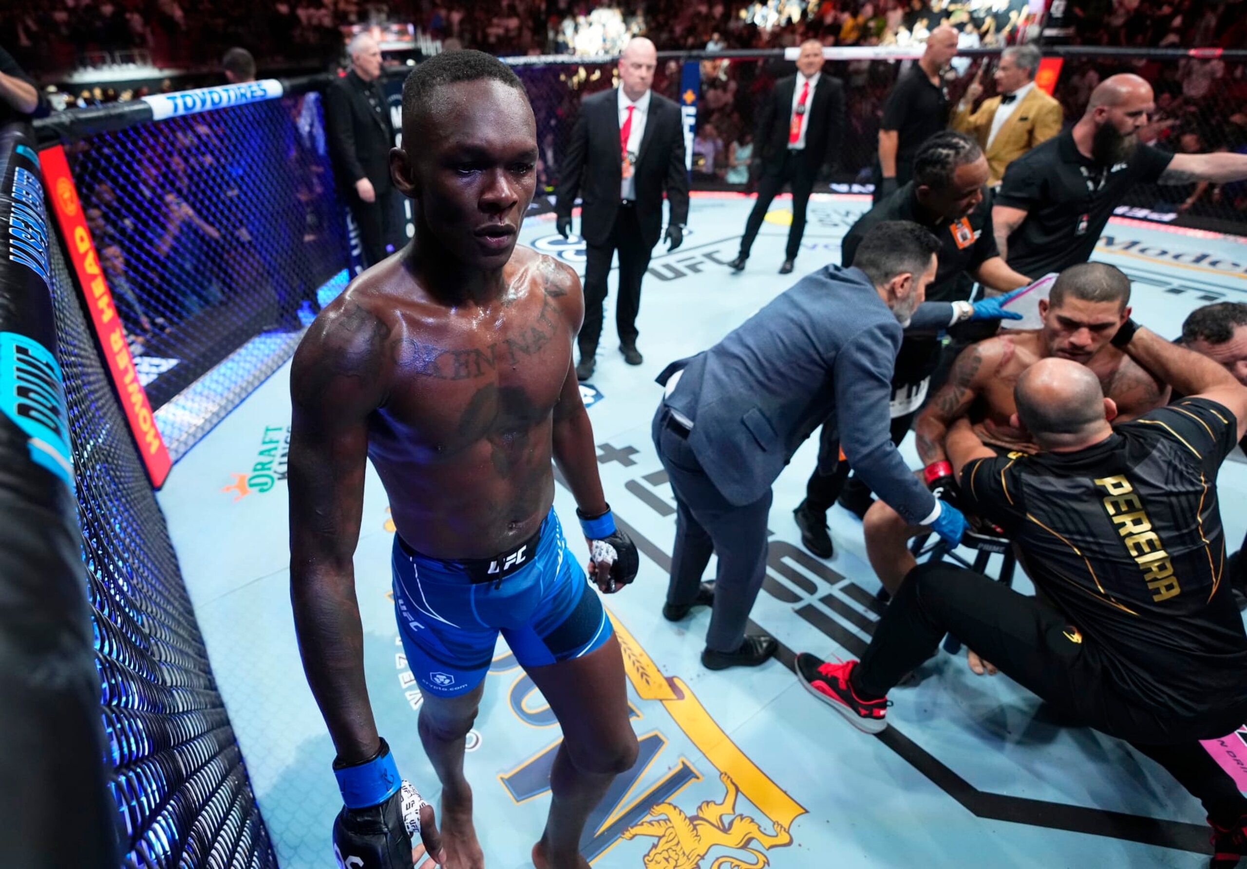 MIAMI, FLORIDA - APRIL 08: Israel Adesanya of Nigeria reacts after knocking out Alex Pereira of Brazil in the UFC middleweight championship fight during the UFC 287 event at Kaseya Center on April 08, 2023 in Miami, Florida. (Photo by Jeff Bottari/Zuffa LLC via Getty Images) MIAMI, FLORIDA - APRIL 08: Israel Adesanya of Nigeria reacts after knocking out Alex Pereira of Brazil in the UFC middleweight championship fight during the UFC 287 event at Kaseya Center on April 08, 2023 in Miami, Florida. (Photo by Jeff Bottari/Zuffa LLC via Getty Images)