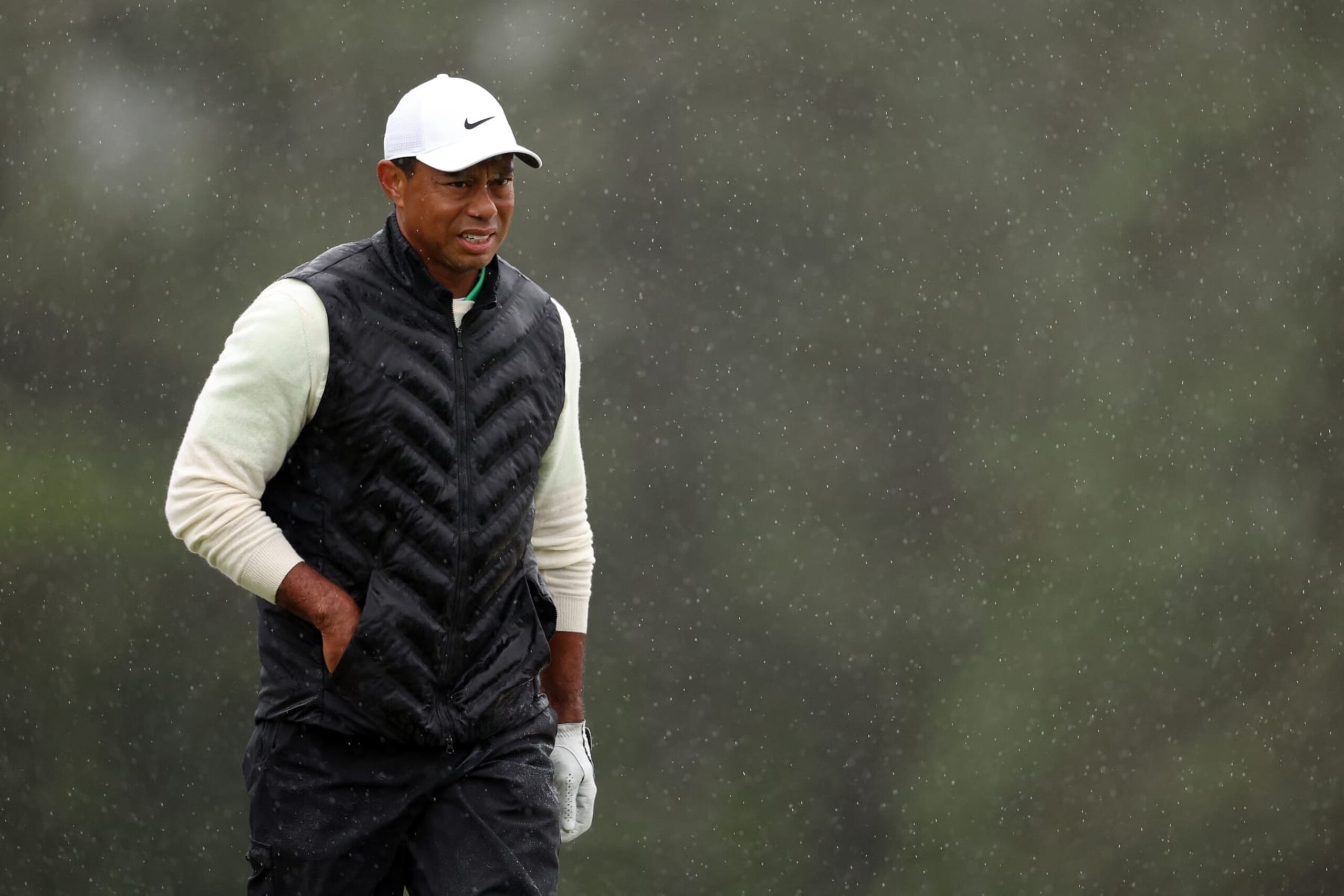 AUGUSTA, GEORGIA - APRIL 08: Tiger Woods of the United States looks on from the 18th green during the continuation of the weather delayed second round of the 2023 Masters Tournament at Augusta National Golf Club on April 08, 2023 in Augusta, Georgia. (Photo by Christian Petersen/Getty Images)