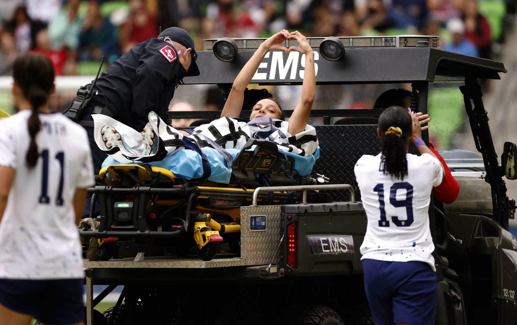 AUSTIN, TEXAS - APRIL 8: Mallory Swanson #9 of the United States gestures toward fans after being injured against the the Republic of Ireland in a 2023 International Friendly match at Q2 Stadium on April 8, 2023 in Austin, Texas. (Photo by Ron Jenkins/Getty Images)