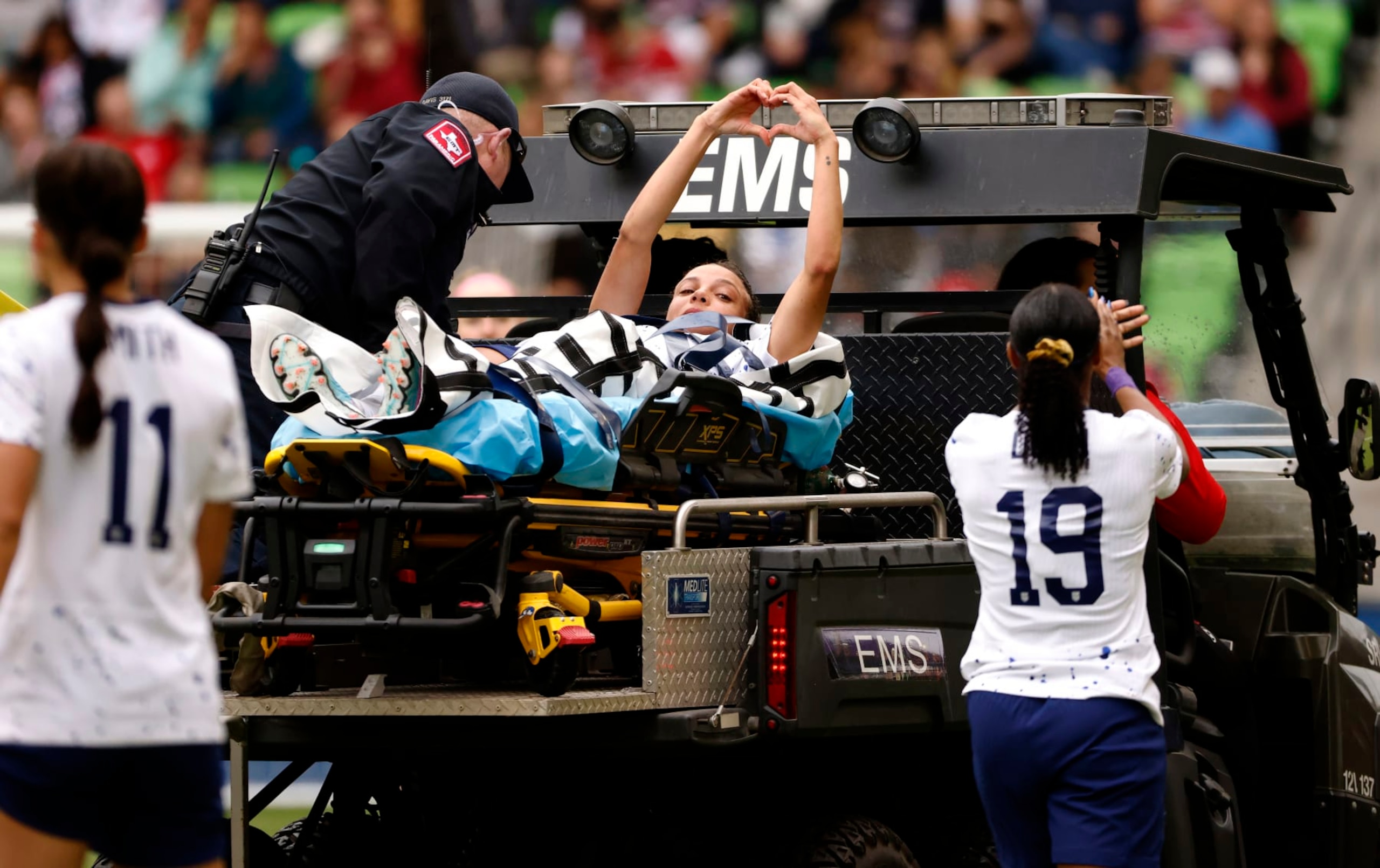 AUSTIN, TEXAS - APRIL 8: Mallory Swanson #9 of the United States gestures toward fans after being injured against the the Republic of Ireland in a 2023 International Friendly match at Q2 Stadium on April 8, 2023 in Austin, Texas. (Photo by Ron Jenkins/Getty Images)