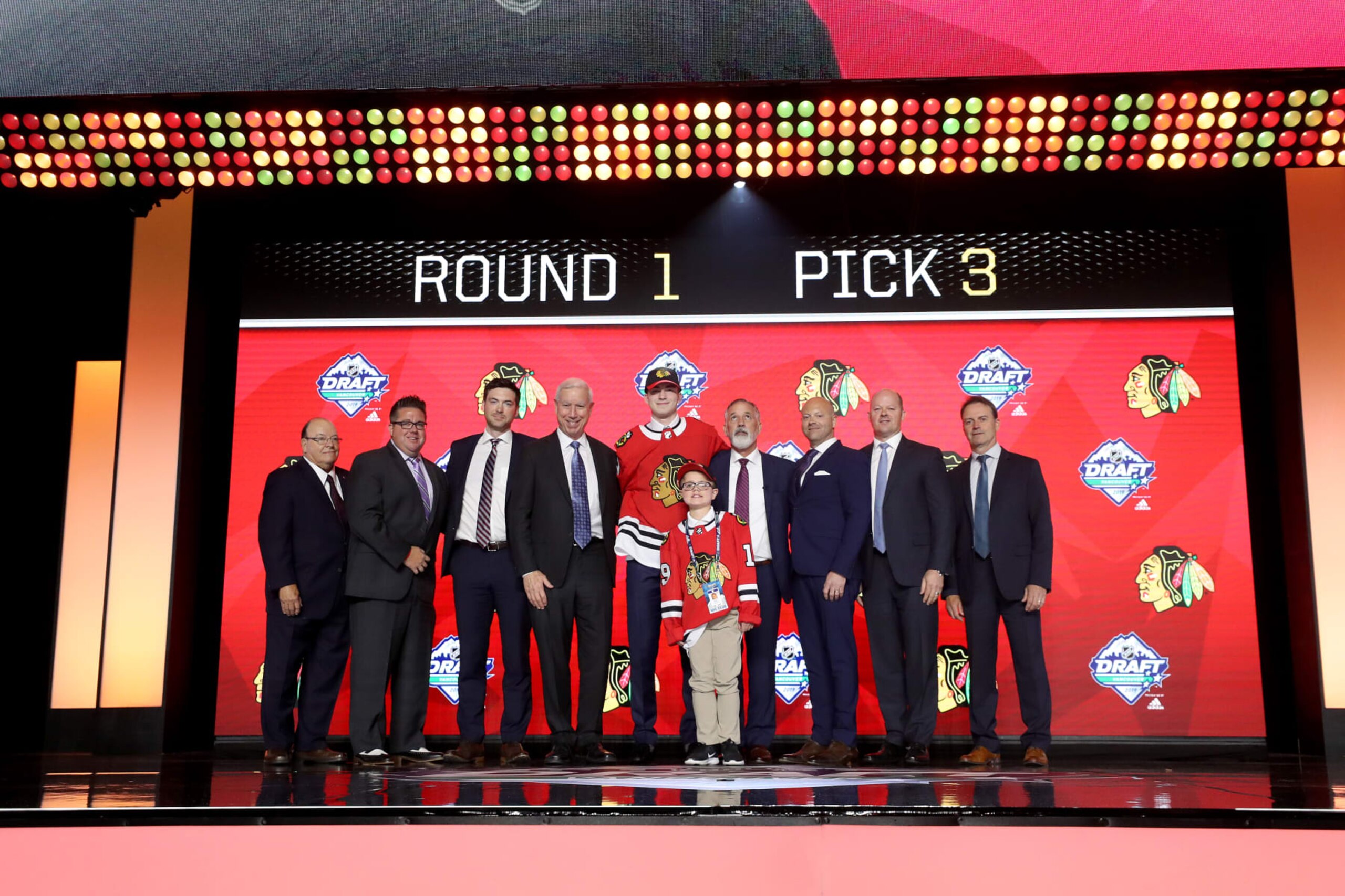 VANCOUVER, BRITISH COLUMBIA - JUNE 21: Kirby Dach reacts after being selected third overall by the Chicago Blackhawks during the first round of the 2019 NHL Draft at Rogers Arena on June 21, 2019 in Vancouver, Canada. (Photo by Bruce Bennett/Getty Images)