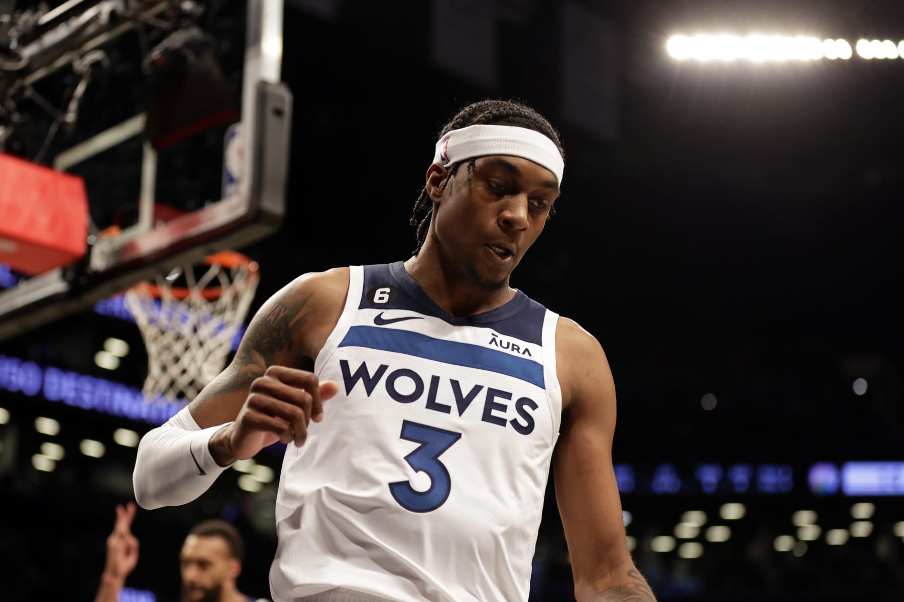 Minnesota Timberwolves forward Jaden McDaniels (3) reacts against the Brooklyn Nets during the first half of an NBA basketball game Tuesday, April 4, 2023, in New York. (AP Photo/Adam Hunger)