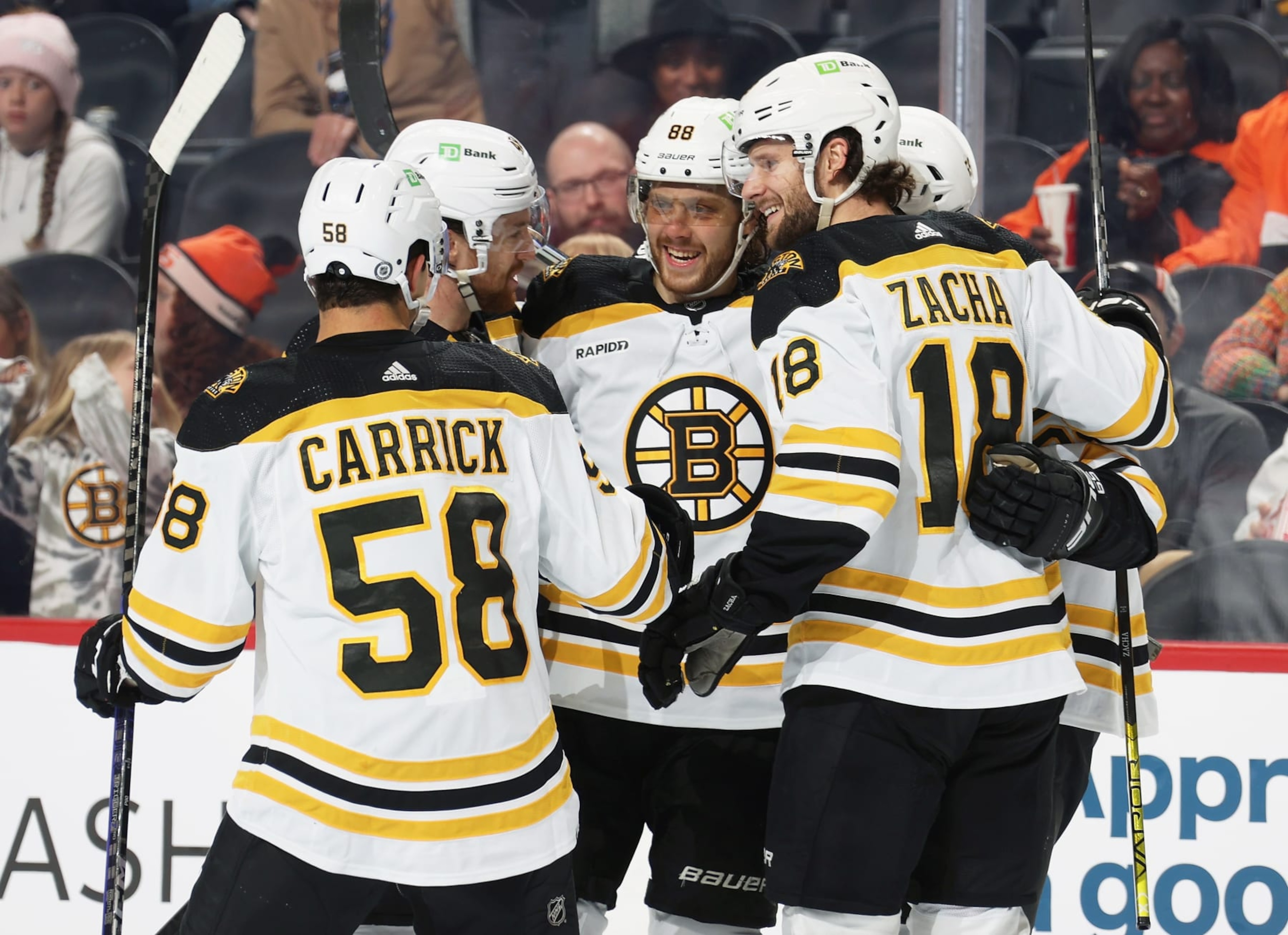 PHILADELPHIA, PENNSYLVANIA - APRIL 09: David Pastrnak #88 of the Boston Bruins celebrates the second of his two second period goals against the Philadelphia Flyers with Connor Carrick #58, Matt Grzelcyk #48, and Pavel Zacha #18 at the Wells Fargo Center on April 9, 2023 in Philadelphia, Pennsylvania. (Photo by Len Redkoles/NHLI via Getty Images) PHILADELPHIA, PENNSYLVANIA - APRIL 09: David Pastrnak #88 of the Boston Bruins celebrates the second of his two second period goals against the Philadelphia Flyers with Connor Carrick #58, Matt Grzelcyk #48, and Pavel Zacha #18 at the Wells Fargo Center on April 9, 2023 in Philadelphia, Pennsylvania. (Photo by Len Redkoles/NHLI via Getty Images)