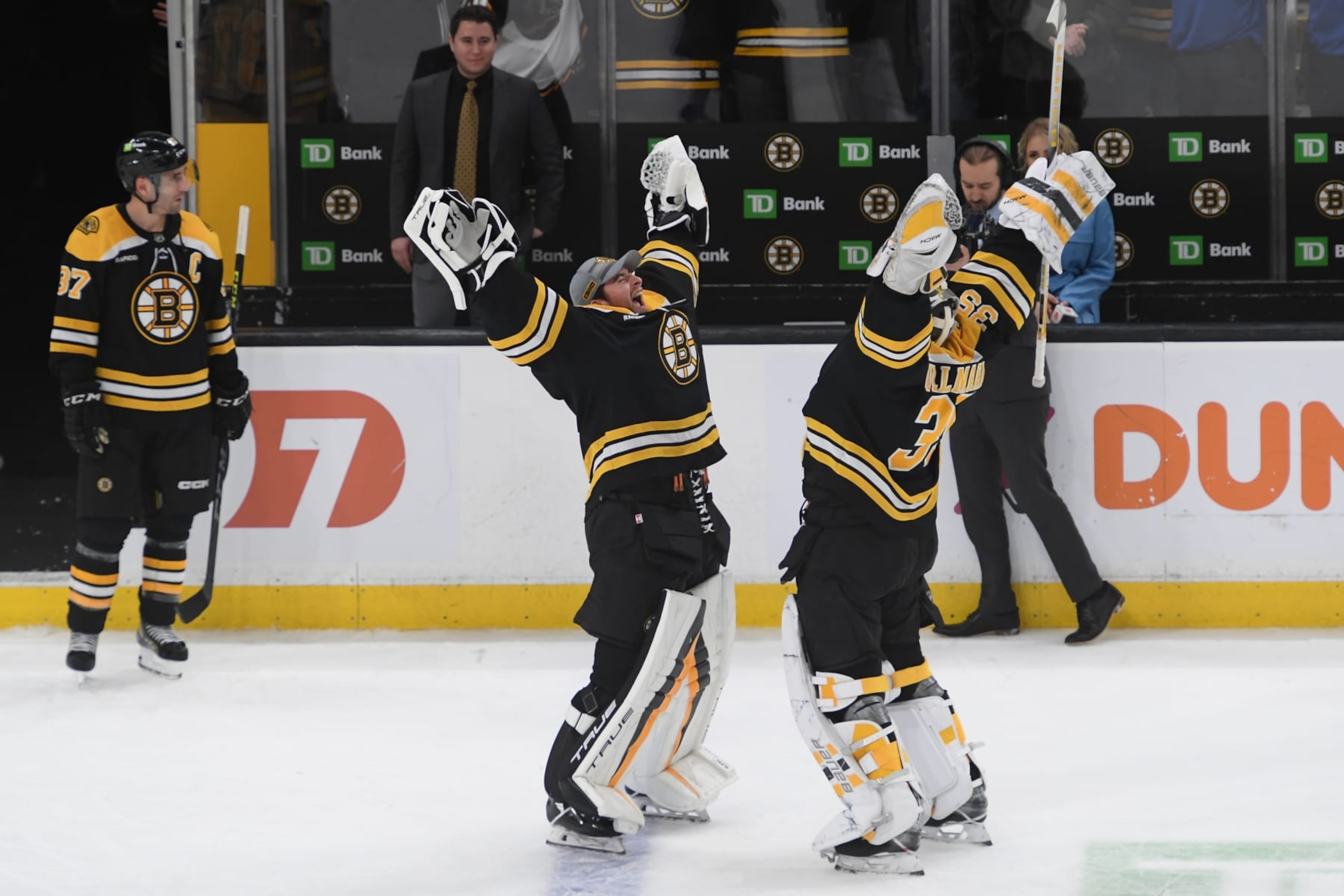 BOSTON, MASSACHUSETTS - APRIL 8: Jeremy Swayman #1 and Linus Ullmark #35 of the Boston Bruins celebrate the win against the New Jersey Devils at the TD Garden on April 8, 2023 in Boston, Massachusetts. (Photo by Steve Babineau/NHLI via Getty Images)
