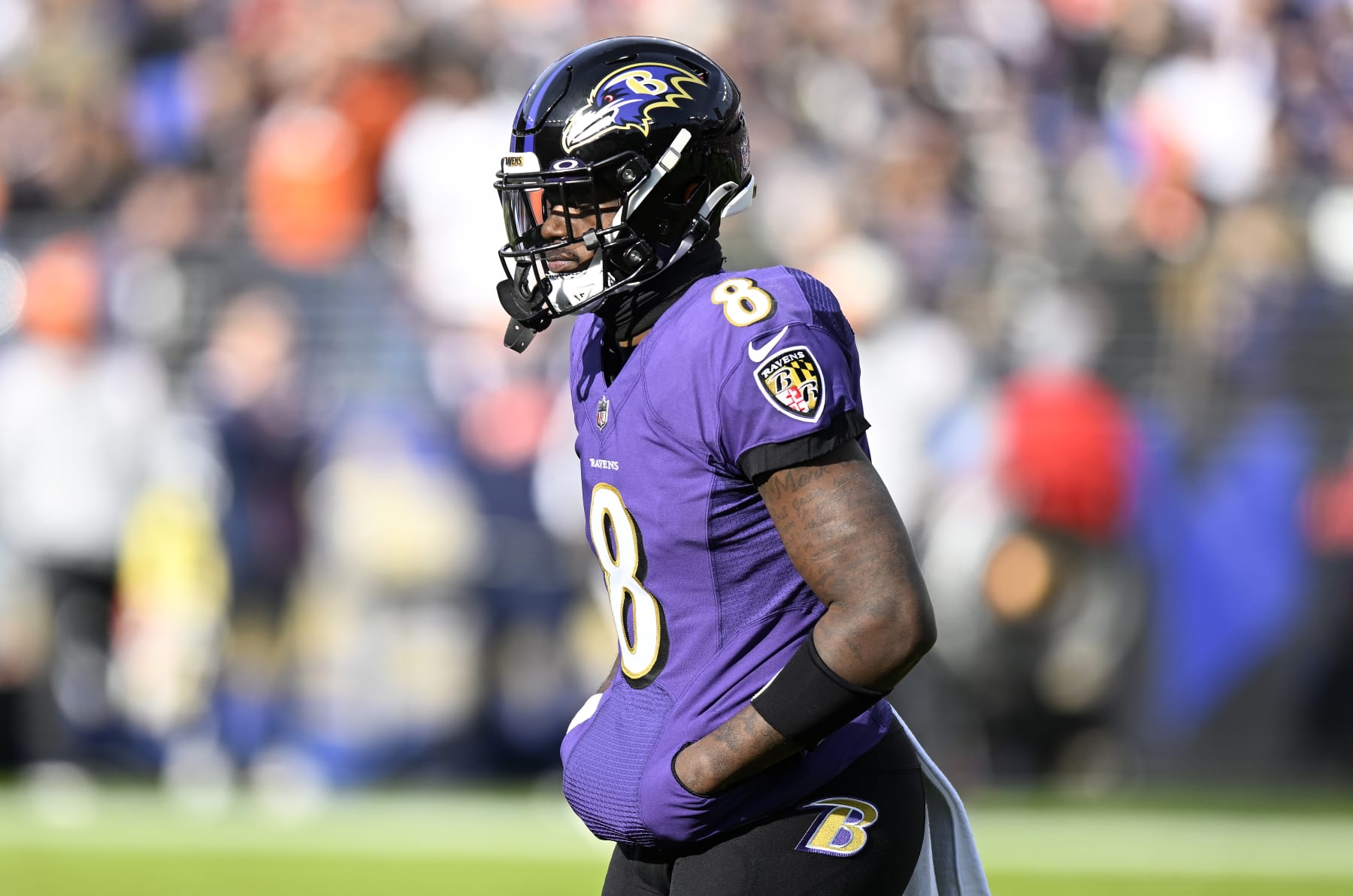 BALTIMORE, MARYLAND - DECEMBER 04: Lamar Jackson #8 of the Baltimore Ravens walks across the field during the game against the Denver Broncos at M&T Bank Stadium on December 04, 2022 in Baltimore, Maryland. (Photo by G Fiume/Getty Images)