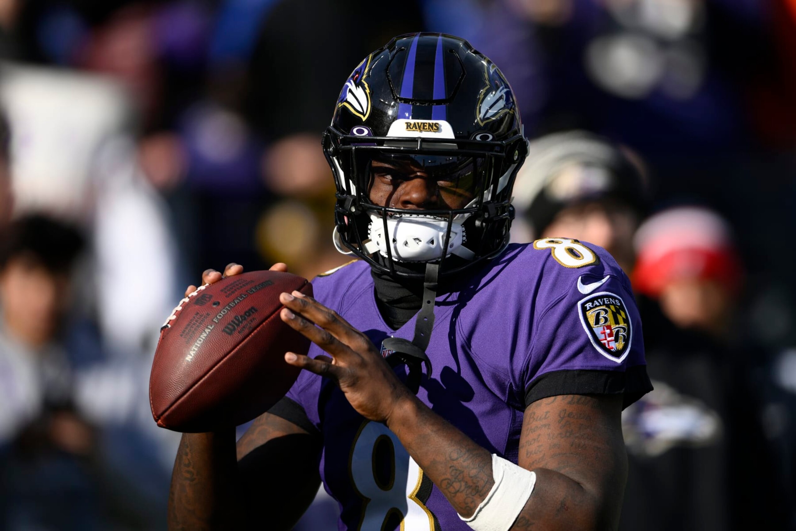 Baltimore Ravens quarterback Lamar Jackson (8) warms up before an NFL football game against the Denver Broncos, Sunday, Dec. 4, 2022, in Baltimore. (AP Photo/Nick Wass)
