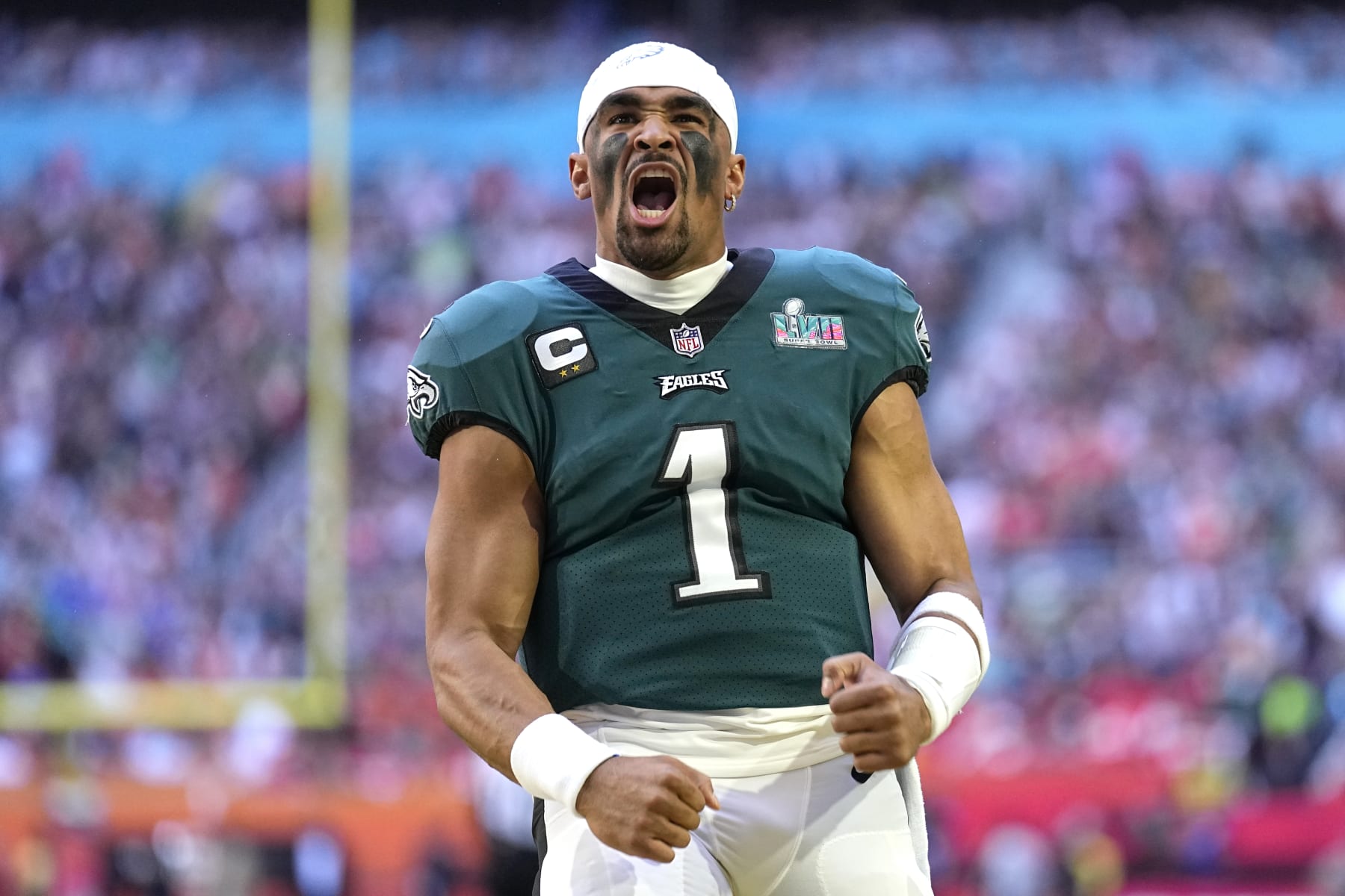Philadelphia Eagles quarterback Jalen Hurts (1) cheers before the start of the NFL Super Bowl 57 football game between the Kansas City Chiefs and the Philadelphia Eagles, Sunday, Feb. 12, 2023, in Glendale, Ariz. (AP Photo/Abbie Parr)