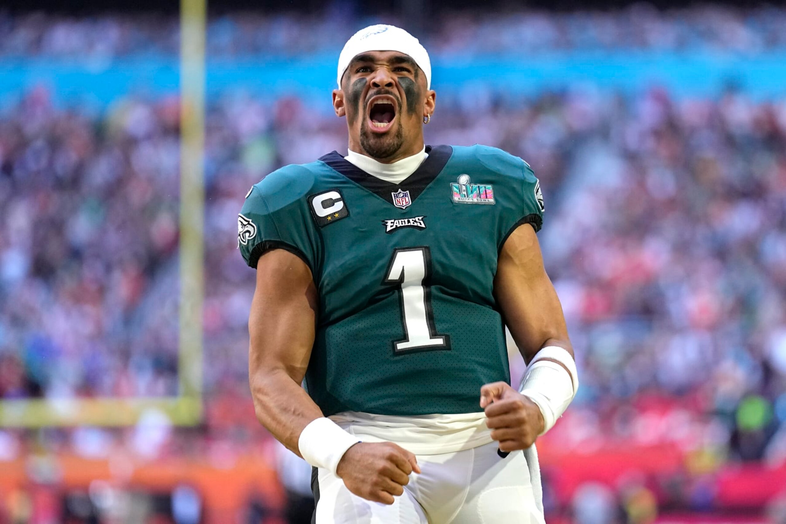 Philadelphia Eagles quarterback Jalen Hurts (1) cheers before the start of the NFL Super Bowl 57 football game between the Kansas City Chiefs and the Philadelphia Eagles, Sunday, Feb. 12, 2023, in Glendale, Ariz. (AP Photo/Abbie Parr)