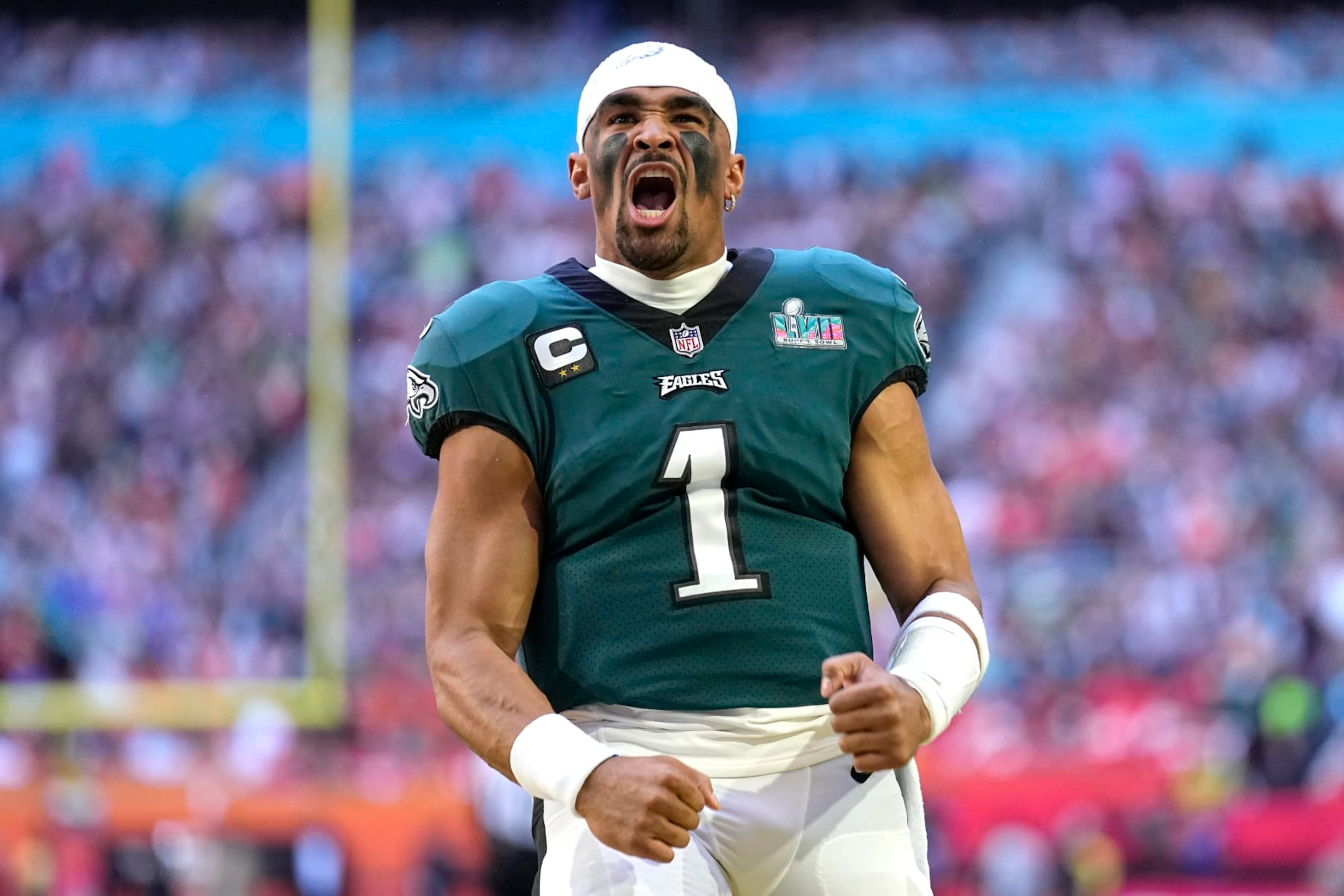 Philadelphia Eagles quarterback Jalen Hurts (1) cheers before the start of the NFL Super Bowl 57 football game between the Kansas City Chiefs and the Philadelphia Eagles, Sunday, Feb. 12, 2023, in Glendale, Ariz. (AP Photo/Abbie Parr)
