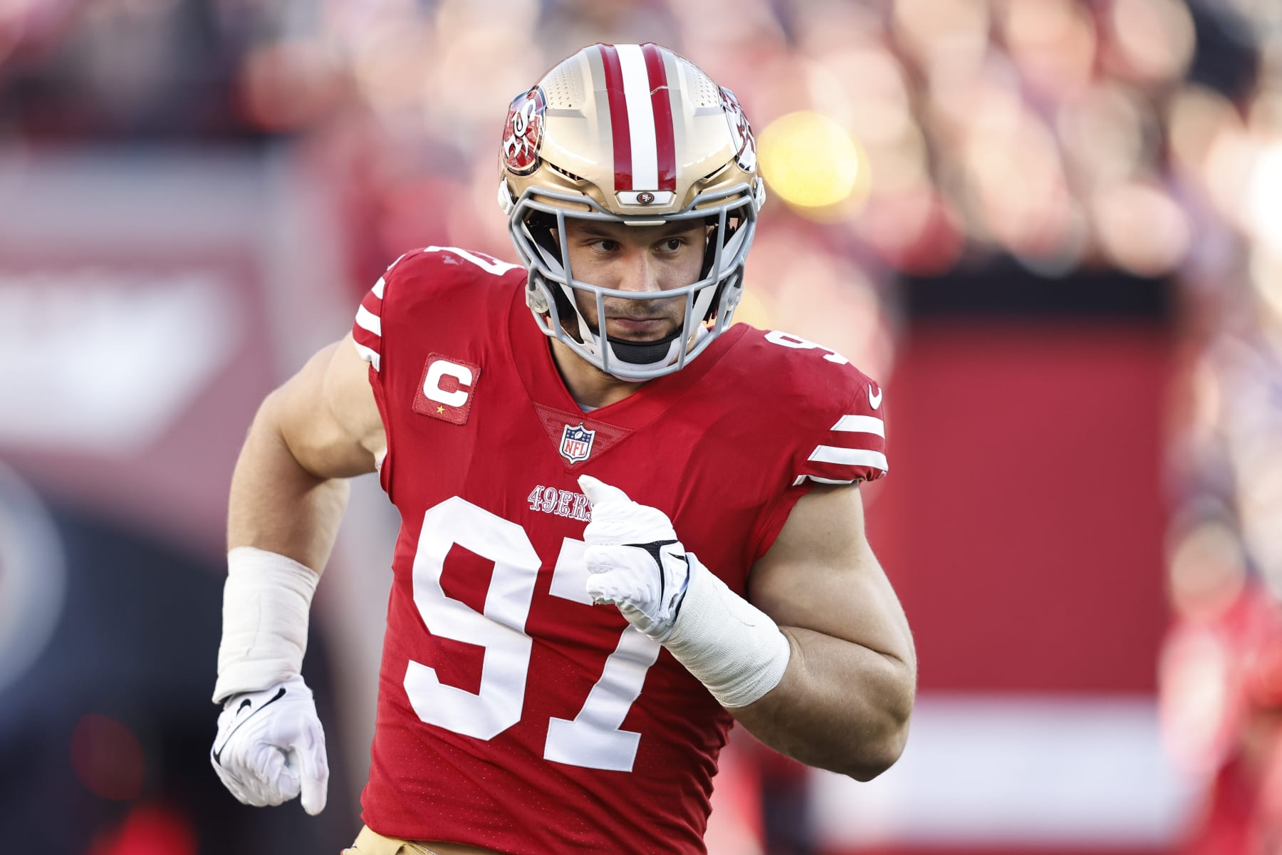 SANTA CLARA, CALIFORNIA - JANUARY 22: Nick Bosa #97 of the San Francisco 49ers runs as he takes the field prior to an NFL divisional round playoff football game between the San Francisco 49ers and the Dallas Cowboys at Levi's Stadium on January 22, 2023 in Santa Clara, California. (Photo by Michael Owens/Getty Images)