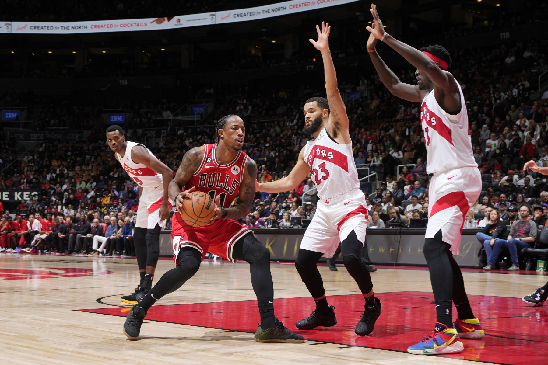 TORONTO, CANADA - OCTOBER 9: DeMar DeRozan #11 of the Chicago Bulls handles the ball during a preseason game against the Toronto Raptors, Fred VanVleet #23 of the Toronto Raptors and Pascal Siakam #43 play defense on October 9, 2022 at the Scotiabank Arena in Toronto, Ontario, Canada.  NOTE TO USER: User expressly acknowledges and agrees that, by downloading and or using this Photograph, user is consenting to the terms and conditions of the Getty Images License Agreement.  Mandatory Copyright Notice: Copyright 2022 NBAE (Photo by Mark Blinch/NBAE via Getty Images)