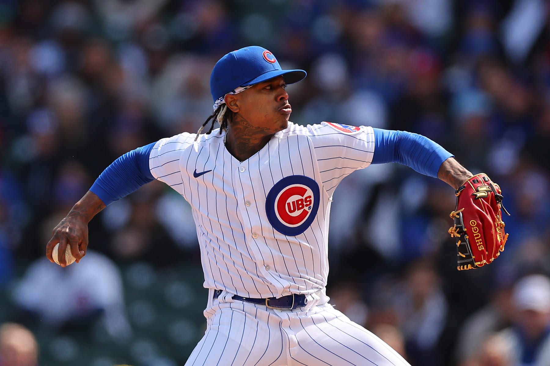 CHICAGO, ILLINOIS - MARCH 30: Marcus Stroman #0 of the Chicago Cubs delivers a pitch during the first inning against the Milwaukee Brewers at Wrigley Field on March 30, 2023 in Chicago, Illinois. (Photo by Michael Reaves/Getty Images)
