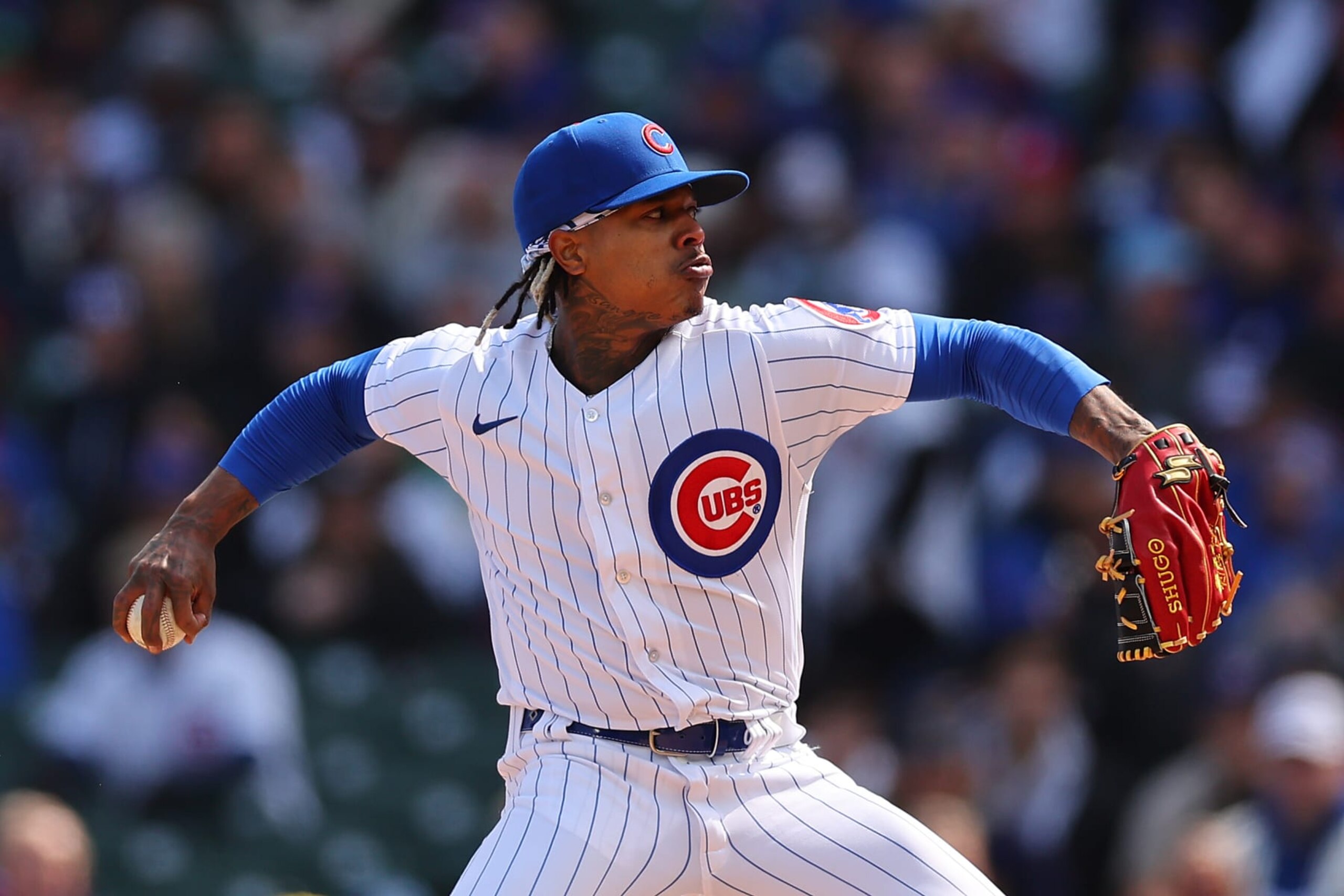 CHICAGO, ILLINOIS - MARCH 30: Marcus Stroman #0 of the Chicago Cubs delivers a pitch during the first inning against the Milwaukee Brewers at Wrigley Field on March 30, 2023 in Chicago, Illinois. (Photo by Michael Reaves/Getty Images)