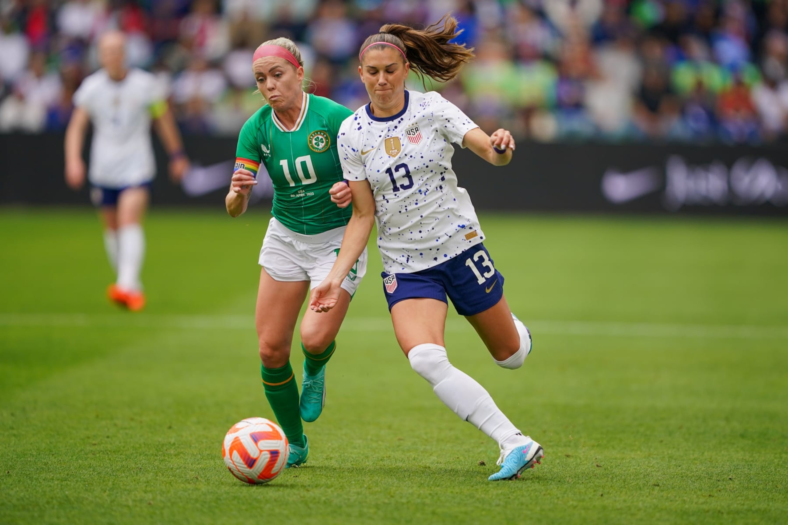 AUSTIN, TX - APRIL 8: Denise OSullivan #10 of the Republic of Ireland and Alex Morgan #13 of the United States fight for a ball during a game between Ireland and USWNT at Q2 Stadium on April 8, 2023 in Austin, Texas. (Photo by John Todd/USSF/Getty Images)