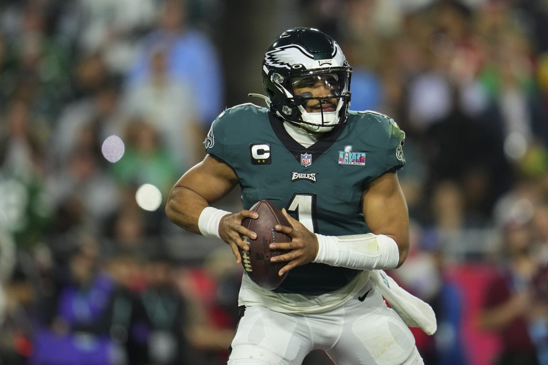 GLENDALE, AZ - FEBRUARY 12: Jalen Hurts #1 of the Philadelphia Eagles scrambles against the Kansas City Chiefs after Super Bowl LVII at State Farm Stadium on February 12, 2023 in Glendale, Arizona. The Chiefs defeated the Eagles 38-35. (Photo by Cooper Neill/Getty Images)