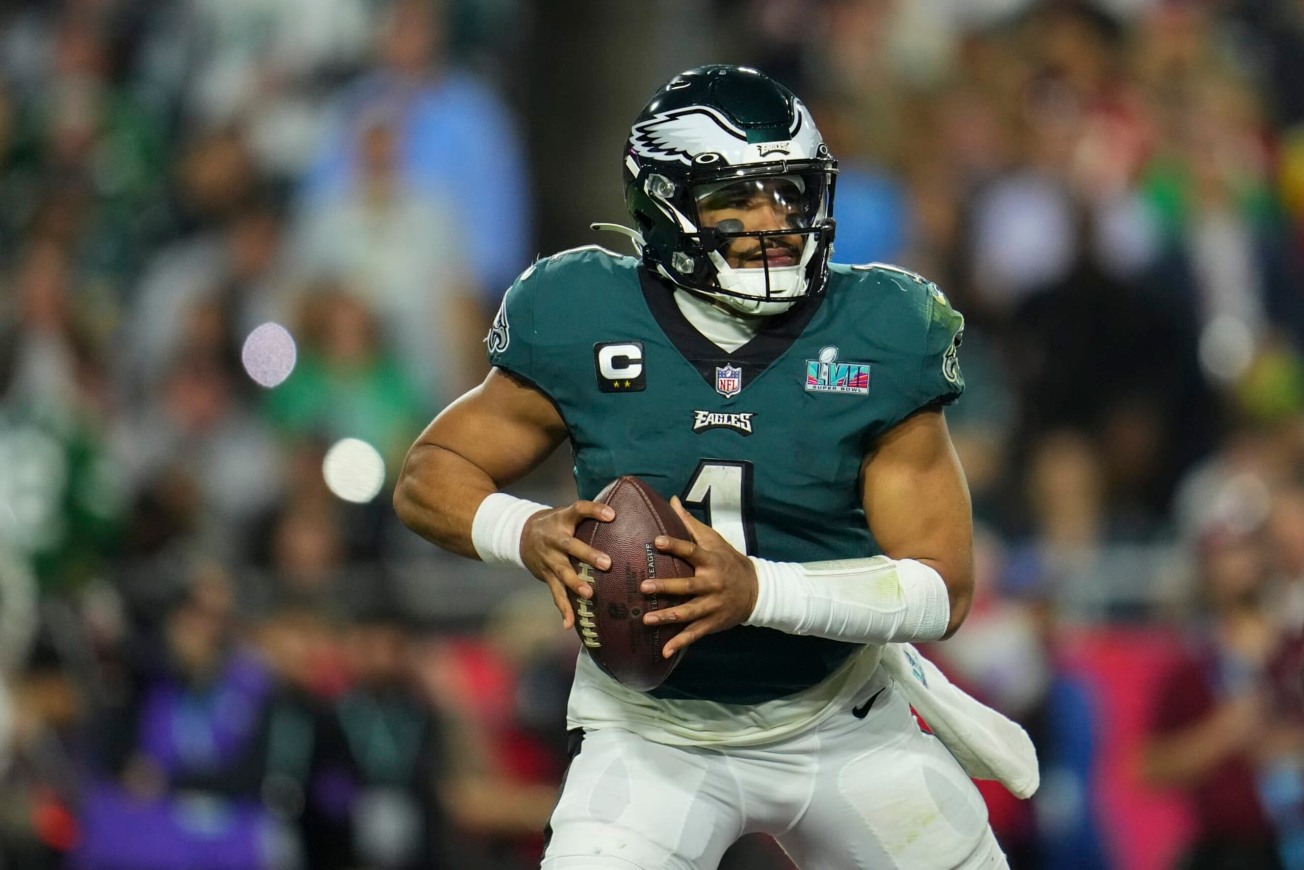GLENDALE, AZ - FEBRUARY 12: Jalen Hurts #1 of the Philadelphia Eagles scrambles against the Kansas City Chiefs after Super Bowl LVII at State Farm Stadium on February 12, 2023 in Glendale, Arizona. The Chiefs defeated the Eagles 38-35. (Photo by Cooper Neill/Getty Images) GLENDALE, AZ - FEBRUARY 12: Jalen Hurts #1 of the Philadelphia Eagles scrambles against the Kansas City Chiefs after Super Bowl LVII at State Farm Stadium on February 12, 2023 in Glendale, Arizona. The Chiefs defeated the Eagles 38-35. (Photo by Cooper Neill/Getty Images)