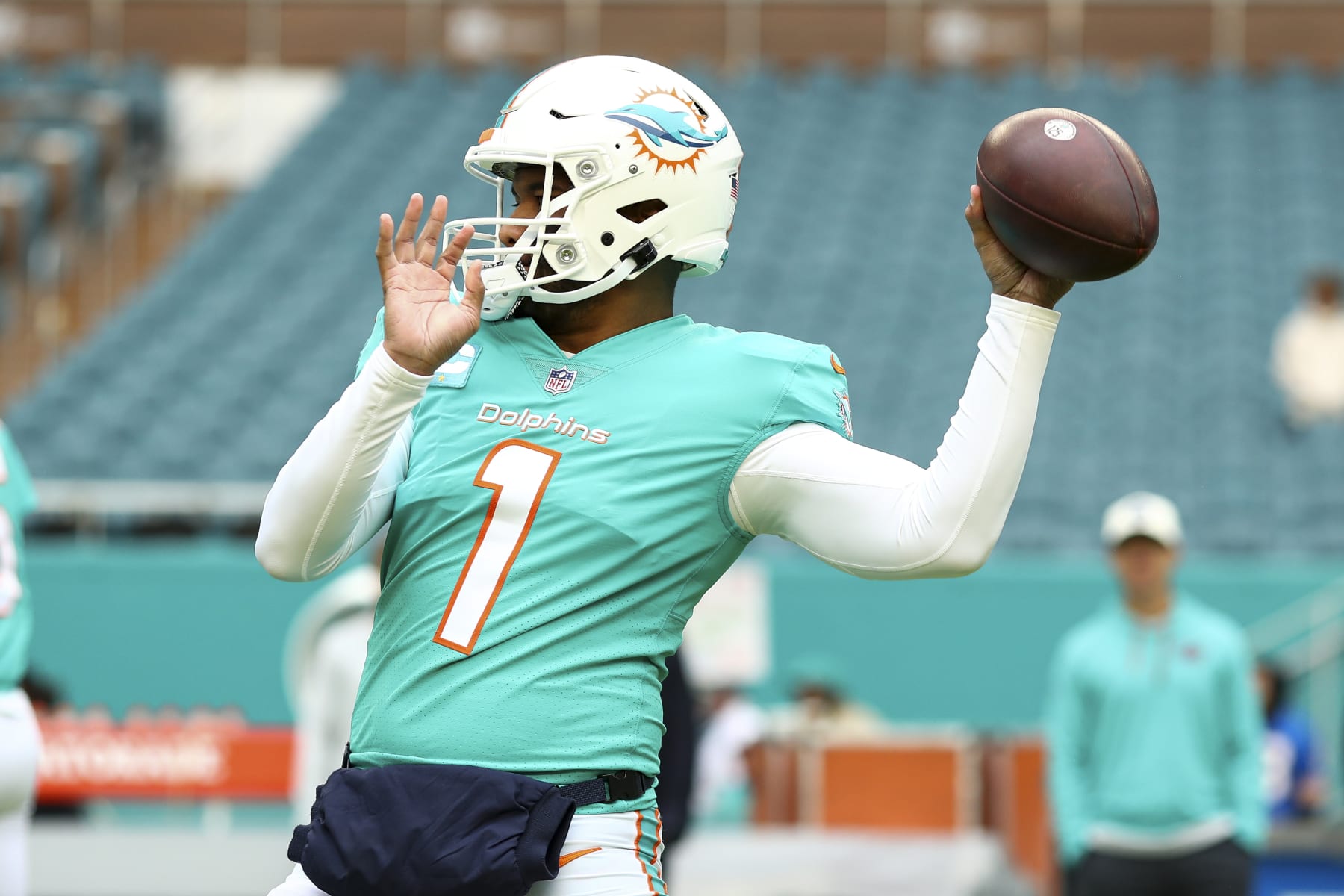 MIAMI GARDENS, FL - DECEMBER 25: Tua Tagovailoa #1 of the Miami Dolphins warms up prior to an NFL football game against the Green Bay Packers at Hard Rock Stadium on December 25, 2022 in Miami Gardens, Florida. (Photo by Kevin Sabitus/Getty Images)