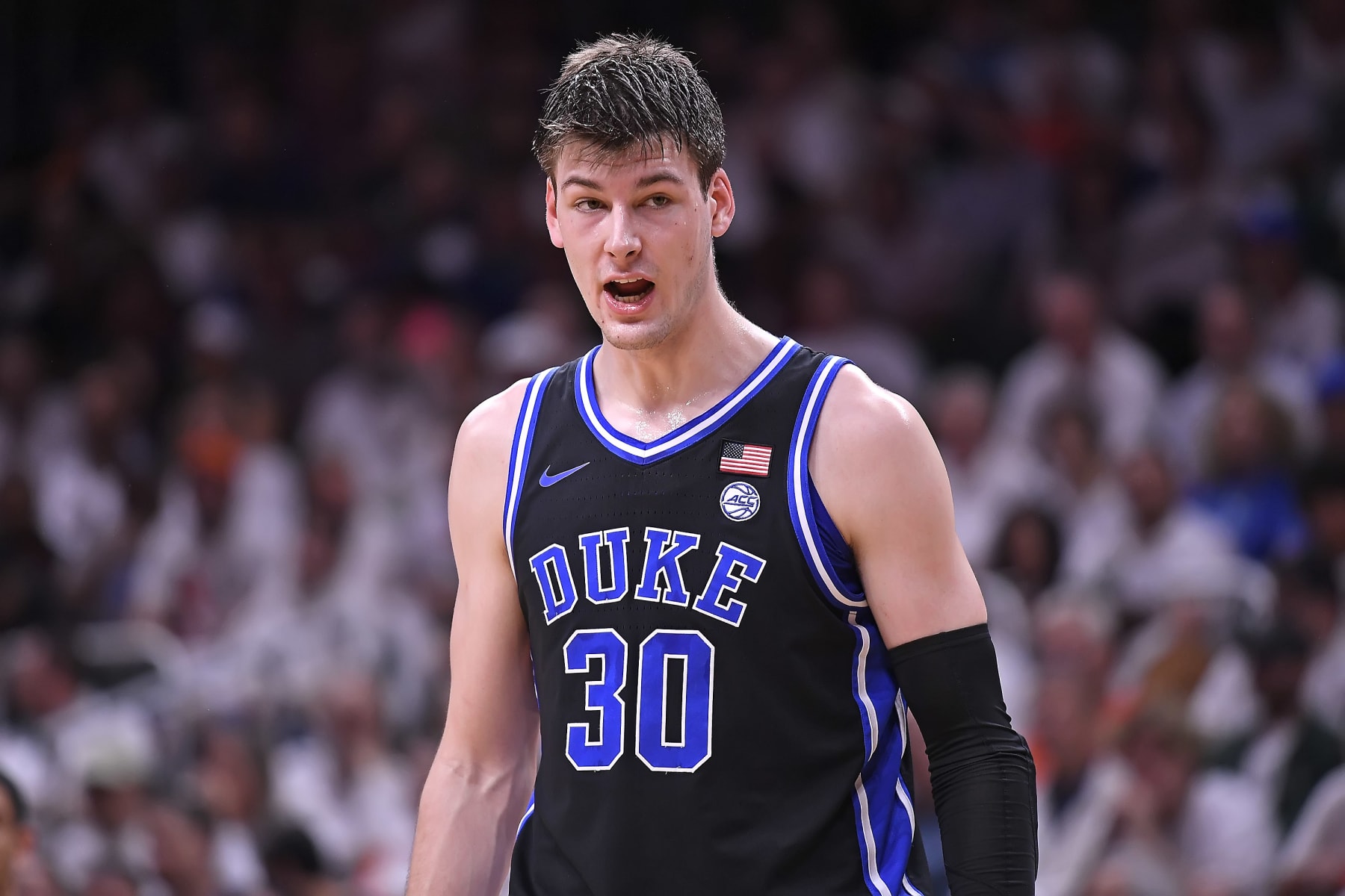 CORAL GABLES, FL - FEB 06: Duke center Kyle Filipowski (30) shouts instructions to a teammate in the first half as the Miami Hurricanes faced the Duke Blue Devils on February 6, 2023, at the Watsco Center in Coral Gables, Florida. (Photo by Samuel Lewis/Icon Sportswire via Getty Images)