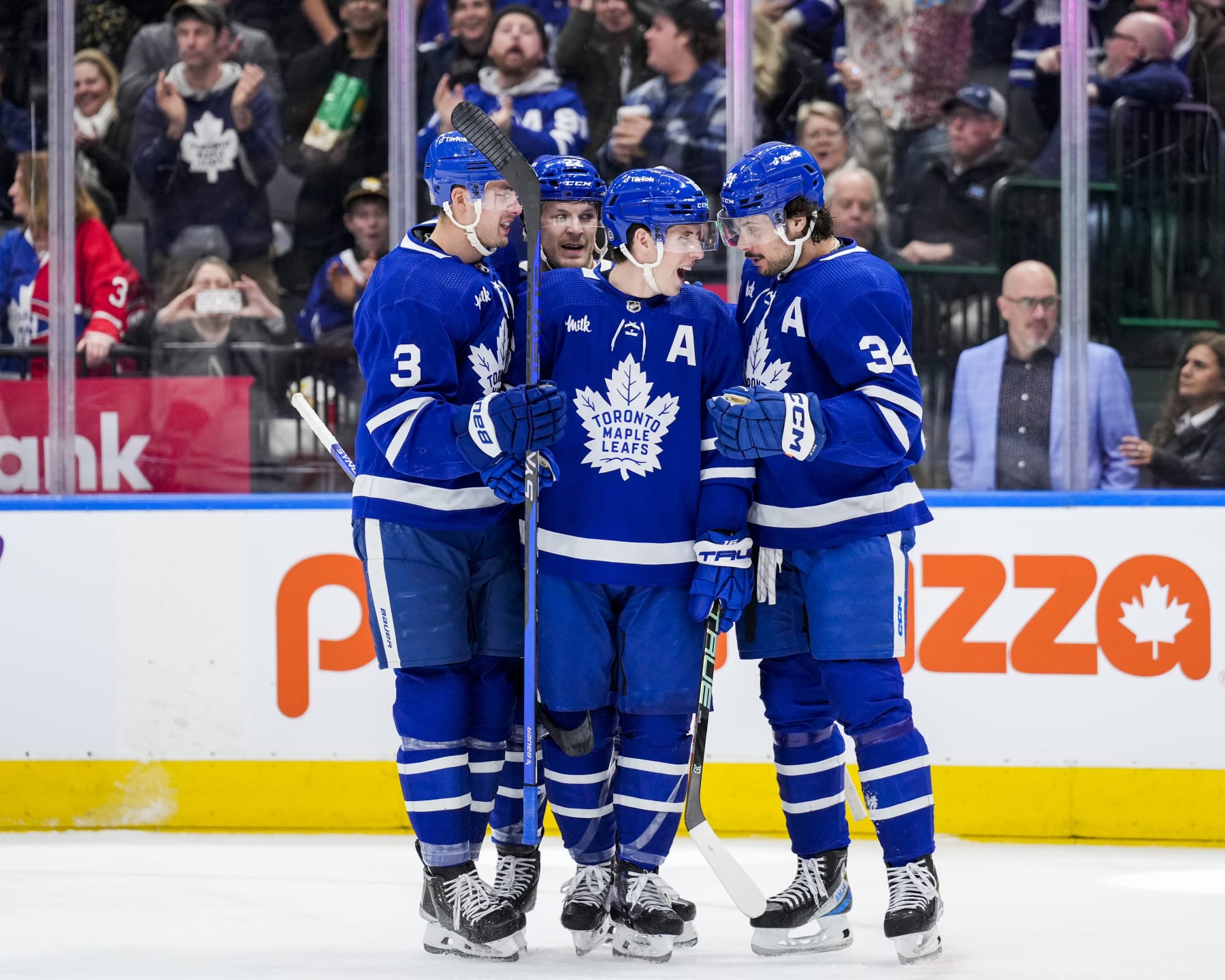 TORONTO, ON - APRIL 8: Mitchell Marner #16 of the Toronto Maple Leafs celebrates his second goal of the game against the Montreal Canadiens with team-mates Justin Holl #3, Jake McCabe #22 and Auston Matthews #34 during the second period at the Scotiabank Arena on April 8, 2023 in Toronto, Ontario, Canada. (Photo by Kevin Sousa/NHLI via Getty Images)
