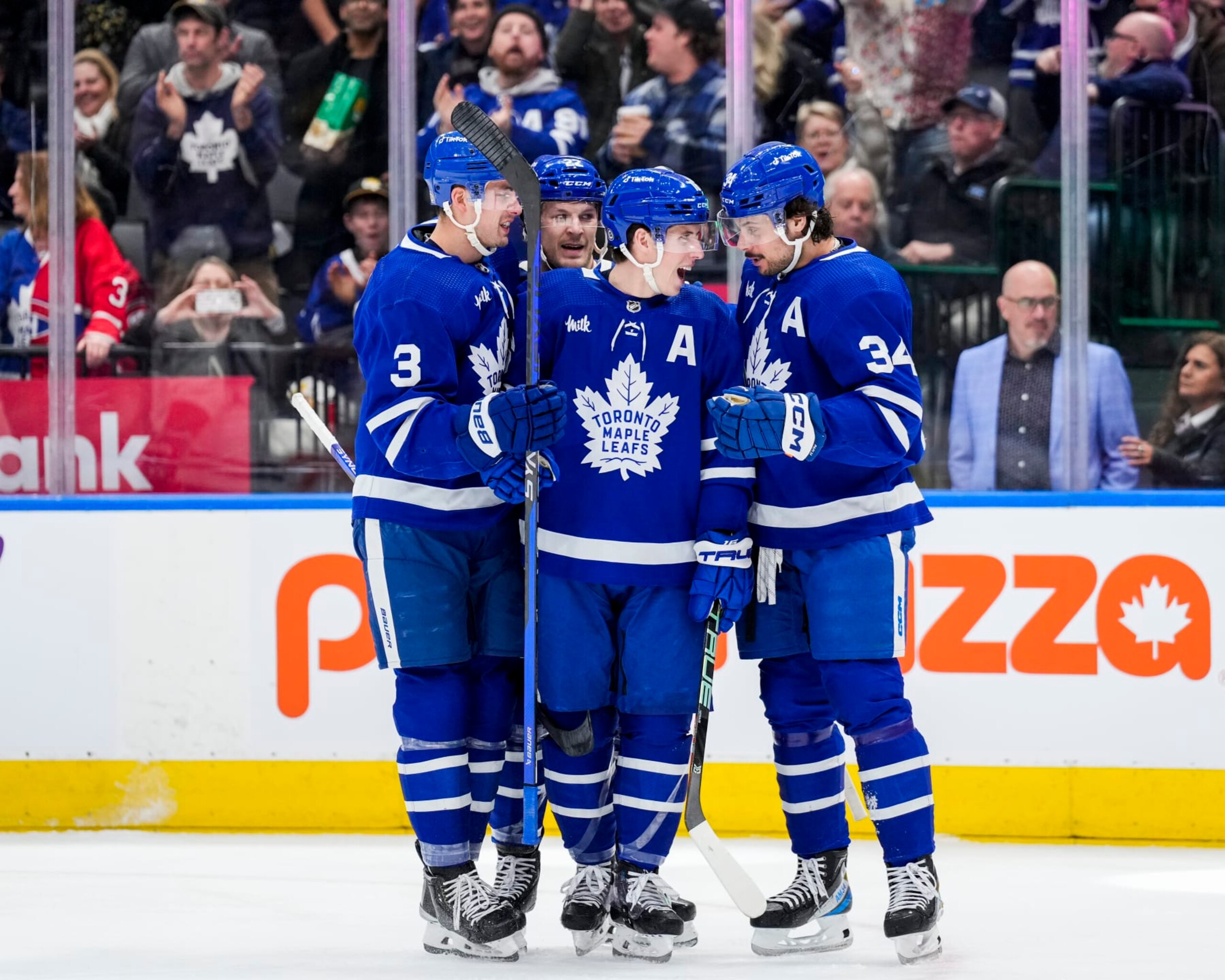 TORONTO, ON - APRIL 8: Mitchell Marner #16 of the Toronto Maple Leafs celebrates his second goal of the game against the Montreal Canadiens with team-mates Justin Holl #3, Jake McCabe #22 and Auston Matthews #34 during the second period at the Scotiabank Arena on April 8, 2023 in Toronto, Ontario, Canada. (Photo by Kevin Sousa/NHLI via Getty Images)