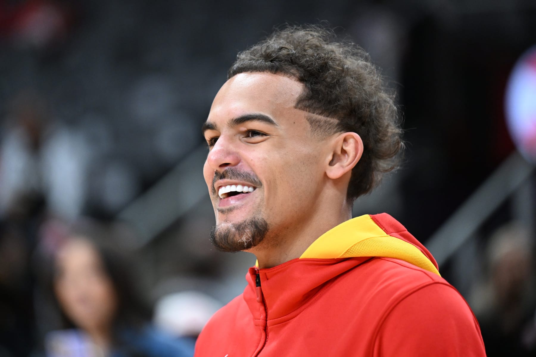 ATLANTA, GA - APRIL 7: Trae Young #11 of the Atlanta Hawk ssmiles before the game against the Philadelphia 76ers on April 7, 2023 at State Farm Arena in Atlanta, Georgia.  NOTE TO USER: User expressly acknowledges and agrees that, by downloading and/or using this Photograph, user is consenting to the terms and conditions of the Getty Images License Agreement. Mandatory Copyright Notice: Copyright 2023 NBAE (Photo by Adam Hagy/NBAE via Getty Images)