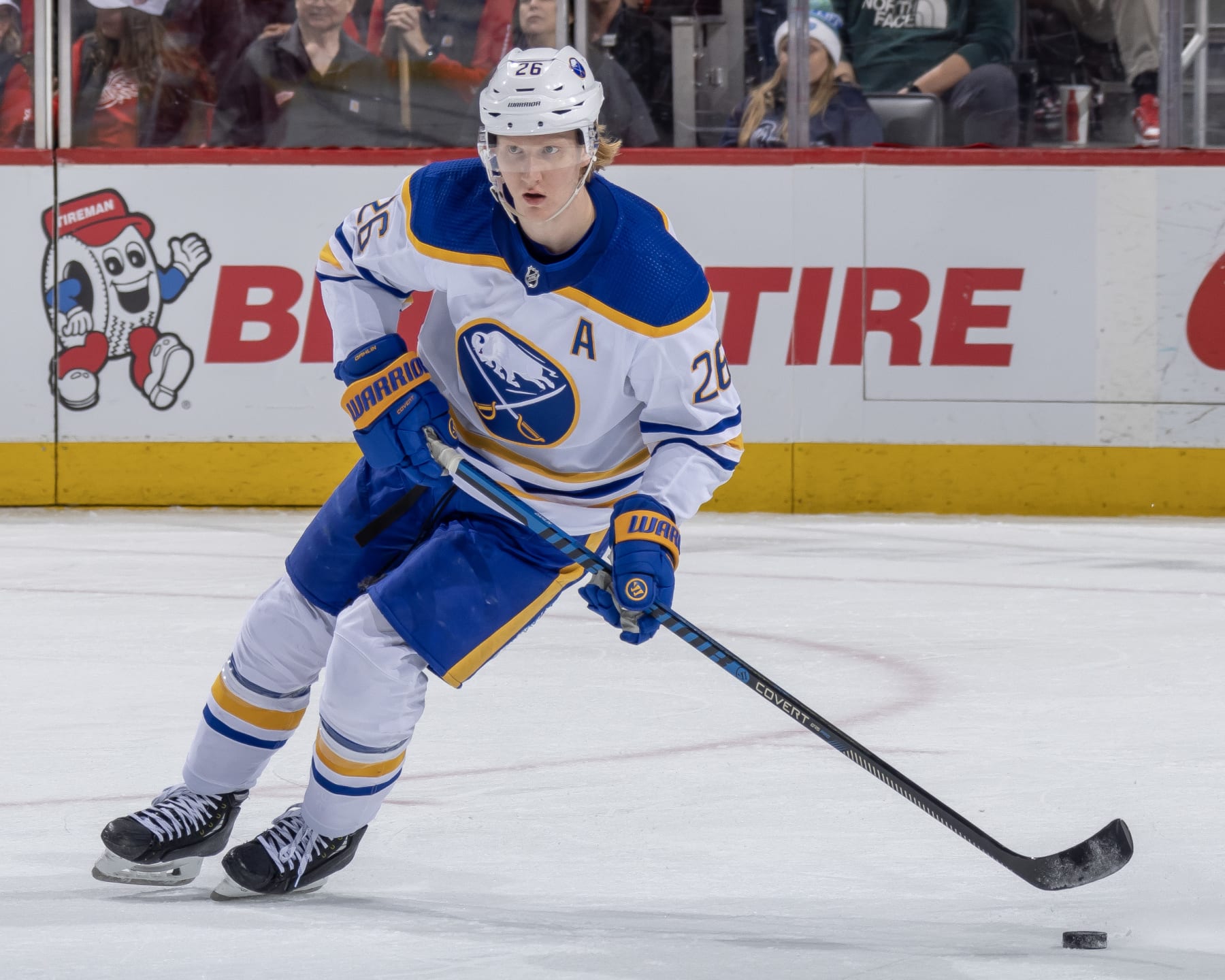 DETROIT, MI - APRIL 06: Rasmus Dahlin #26 of the Buffalo Sabres skates up ice with the puck against the Detroit Red Wings during the first period of an NHL game at Little Caesars Arena on April 6, 2023 in Detroit, Michigan. Buffalo defeated Detroit in an O.T. shoot-out 7-6. (Photo by Dave Reginek/NHLI via Getty Images)
