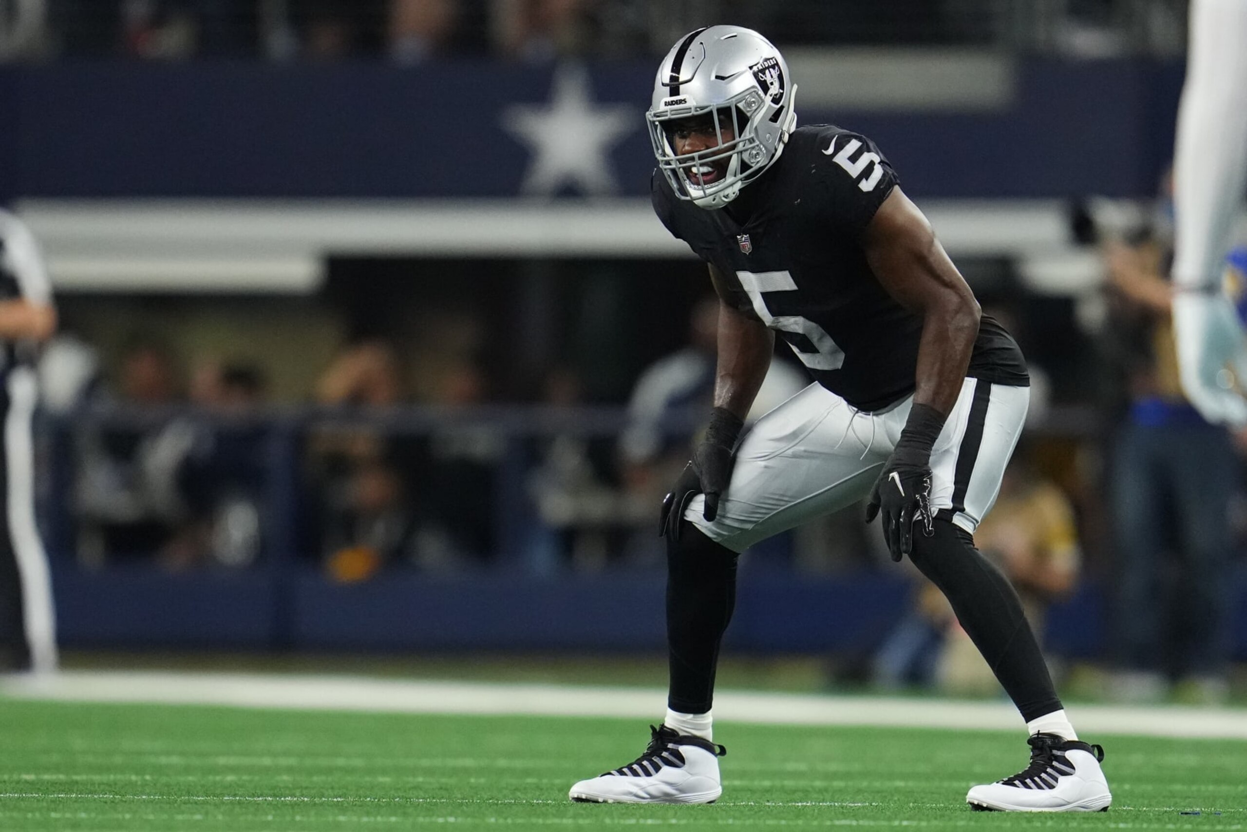 ARLINGTON, TEXAS - NOVEMBER 25: Divine Deablo #5 of the Las Vegas Raiders gets set for the kick against the Dallas Cowboys during an NFL game at AT&T Stadium on November 25, 2021 in Arlington, Texas. (Photo by Cooper Neill/Getty Images)