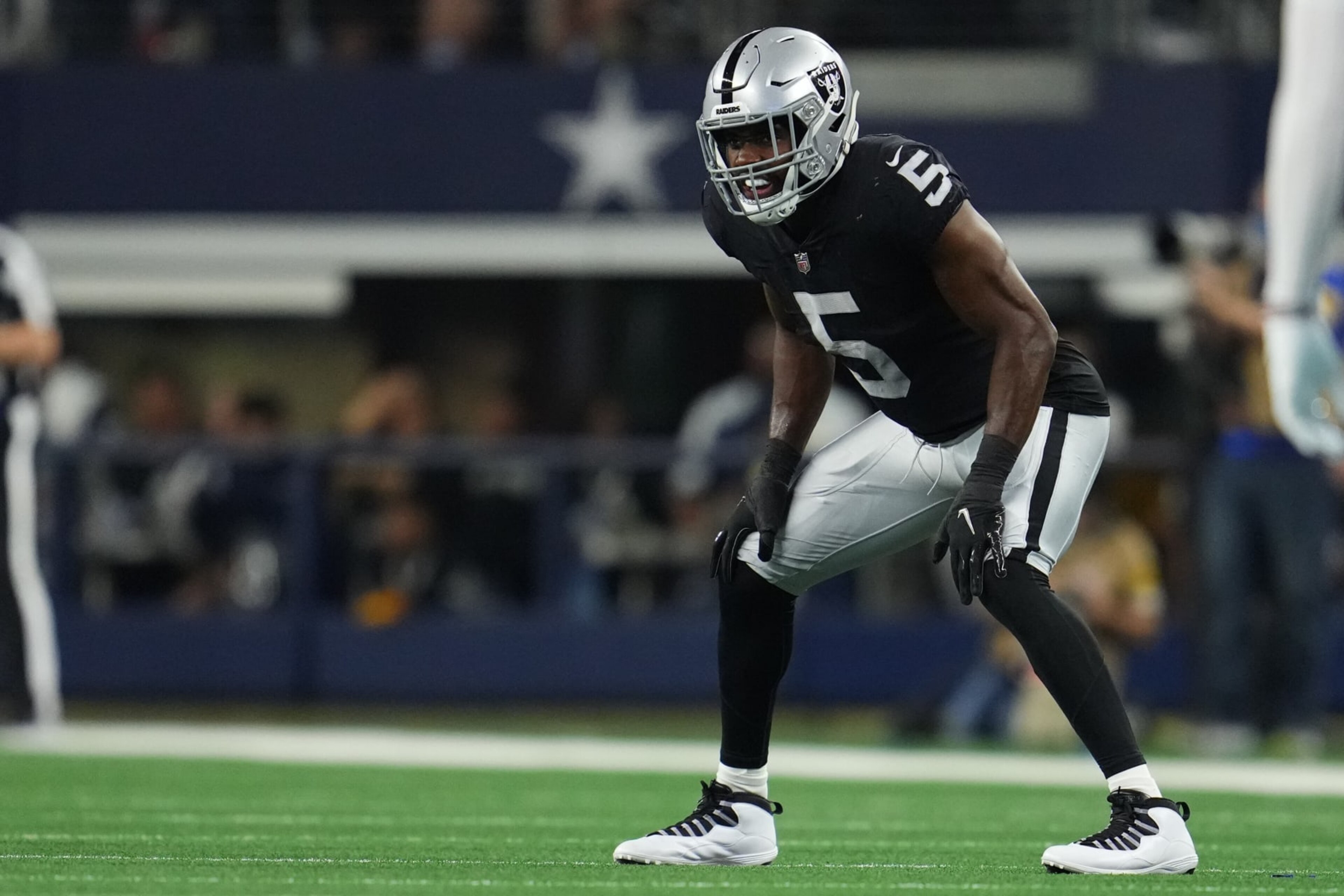 ARLINGTON, TEXAS - NOVEMBER 25: Divine Deablo #5 of the Las Vegas Raiders gets set for the kick against the Dallas Cowboys during an NFL game at AT&T Stadium on November 25, 2021 in Arlington, Texas. (Photo by Cooper Neill/Getty Images)