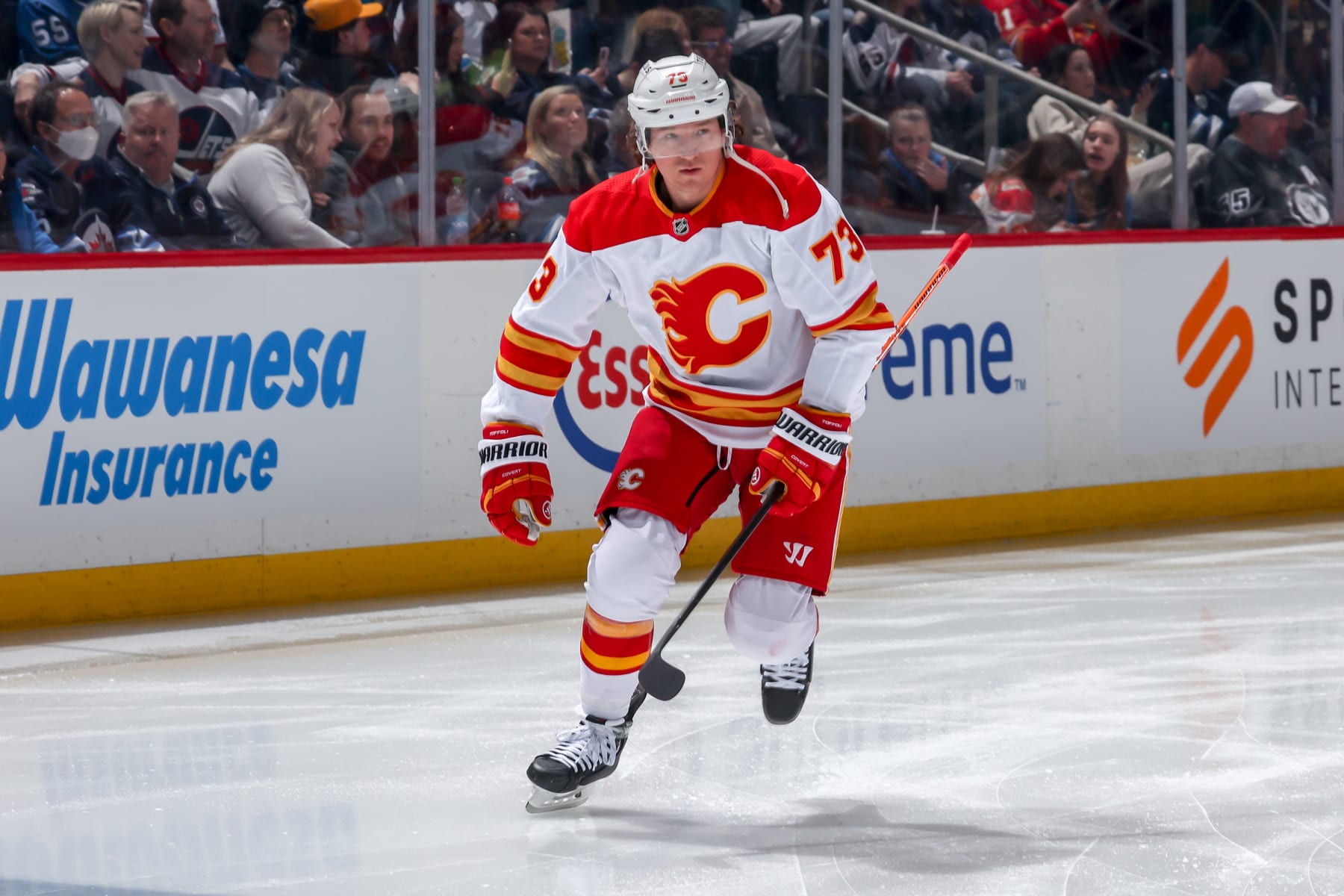 WINNIPEG, CANADA - APRIL 5: Tyler Toffoli #73 of the Calgary Flames hits the ice prior to puck drop against the Winnipeg Jets at the Canada Life Centre on April 5, 2023 in Winnipeg, Manitoba, Canada. (Photo by Jonathan Kozub/NHLI via Getty Images)