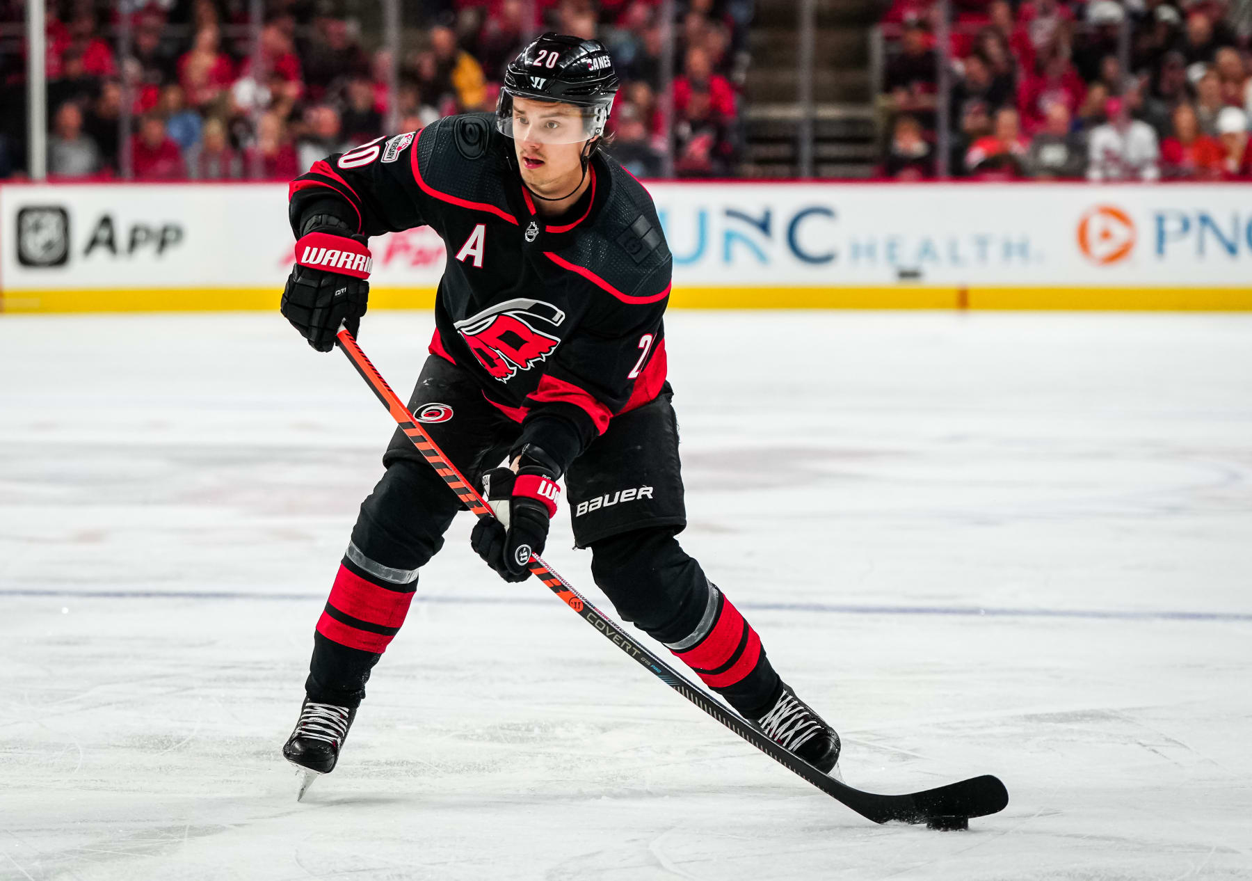 RALEIGH, NORTH CAROLINA - APRIL 02: Sebastian Aho #20 of the Carolina Hurricanes skates during the third period against the New York Islanders at PNC Arena on April 02, 2023 in Raleigh, North Carolina. (Photo by Josh Lavallee/NHLI via Getty Images)