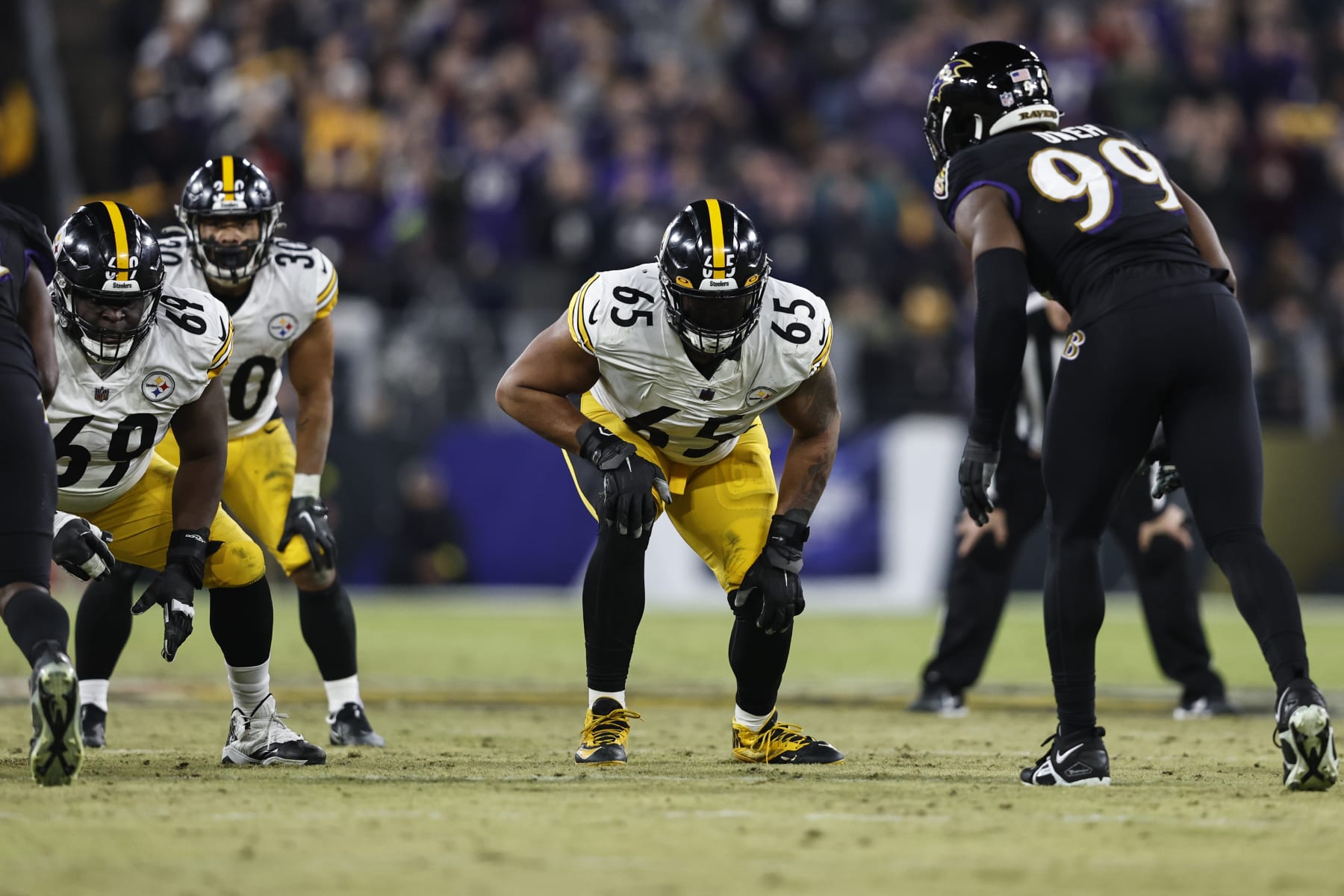 BALTIMORE, MARYLAND - JANUARY 01: Dan Moore Jr. #65 of the Pittsburgh Steelers lines up during an NFL football game between the Baltimore Ravens and the Pittsburgh Steelers at M&T Bank Stadium on January 01, 2023 in Baltimore, Maryland. (Photo by Michael Owens/Getty Images)