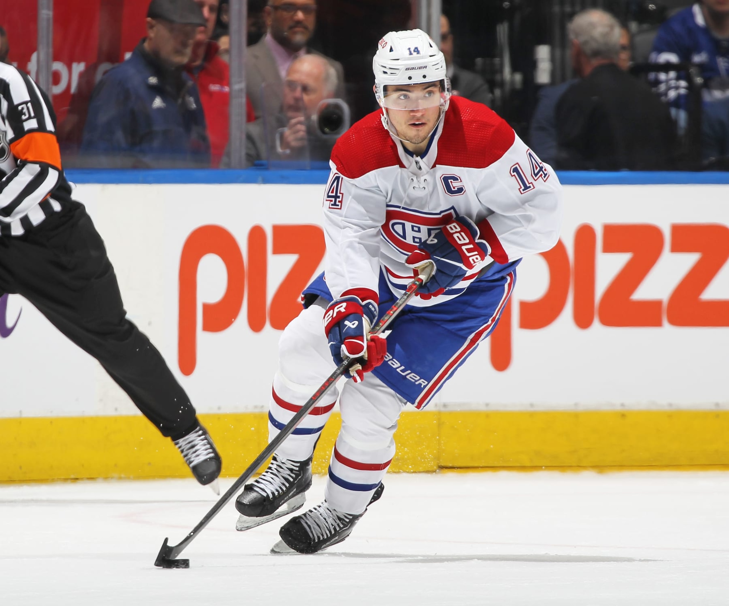 TORONTO, CANADA - APRIL 8: Nick Suzuki #14 of the Montreal Canadiens skates with the puck against the Toronto Maple Leafs during an NHL game at Scotiabank Arena on April 8, 2023 in Toronto, Ontario, Canada. The Maple Leafs defeated the Canadiens 7-1.(Photo by Claus Andersen/Getty Images) TORONTO, CANADA - APRIL 8: Nick Suzuki #14 of the Montreal Canadiens skates with the puck against the Toronto Maple Leafs during an NHL game at Scotiabank Arena on April 8, 2023 in Toronto, Ontario, Canada. The Maple Leafs defeated the Canadiens 7-1.(Photo by Claus Andersen/Getty Images)