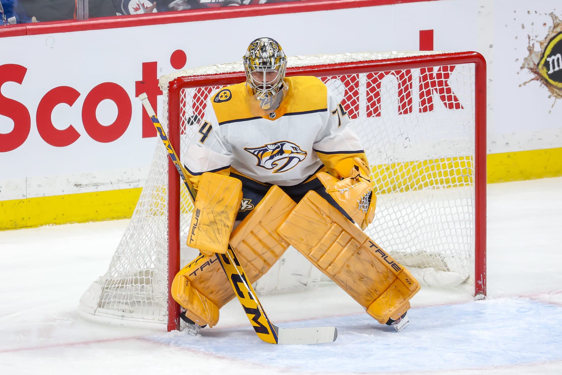 WINNIPEG, CANADA - APRIL 8: Goaltender Juuse Saros #74 of the Nashville Predators keeps an eye on the play during first period action against the Winnipeg Jets at the Canada Life Centre on April 8, 2023 in Winnipeg, Manitoba, Canada. (Photo by Jonathan Kozub/NHLI via Getty Images)