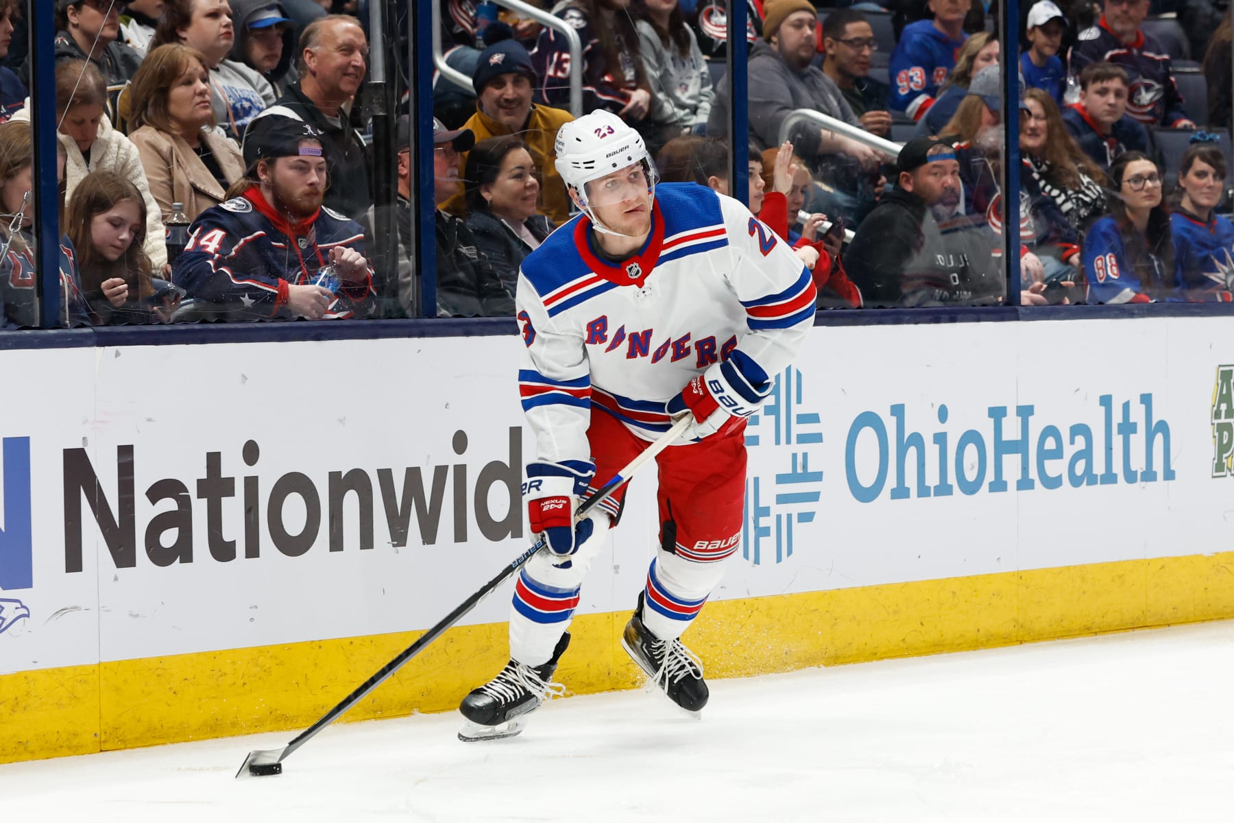 COLUMBUS, OH - APRIL 08: New York Rangers defenseman Adam Fox (23) with the puck during the third period in a game against the Columbus Blue Jackets on April 8, 2023, at Nationwide Arena in Columbus, Ohio. (Photo by Graham Stokes/Icon Sportswire via Getty Images)