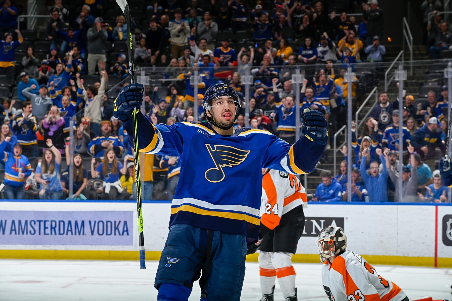 ST. LOUIS, MO - APRIL 4: Jordan Kyrou #25 of the St. Louis Blues celebrates after scoring a goal against the Philadelphia Flyers at the Enterprise Center on April 4, 2023 in St. Louis, Missouri. (Photo by Alexis Knight NHLI via Getty Images)