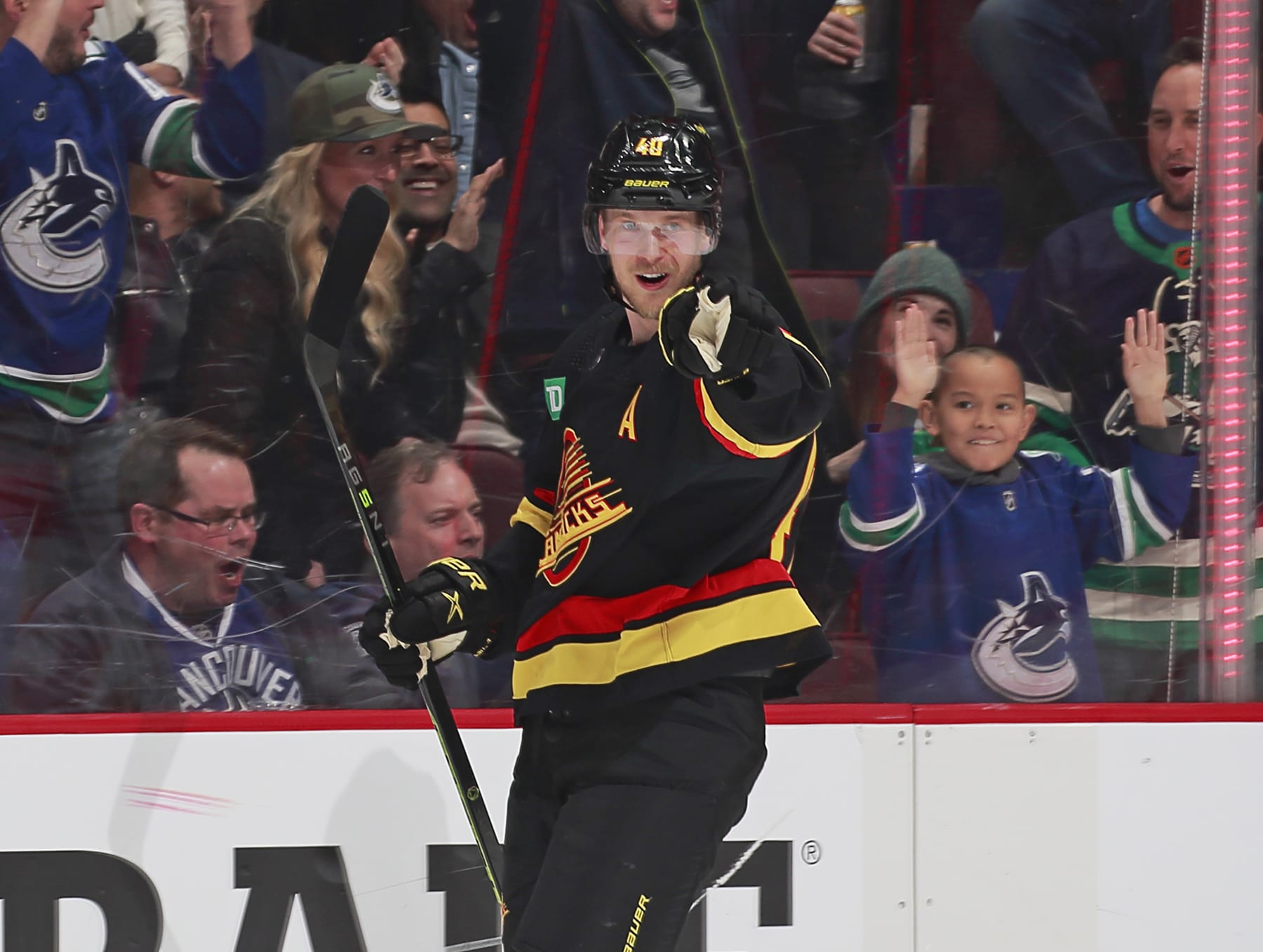 VANCOUVER, CANADA - APRIL 8: Elias Pettersson #40 of the Vancouver Canucks celebrates his goal during the first period of their NHL game against the Calgary Flames at Rogers Arena April 8, 2023 in Vancouver, British Columbia, Canada.  (Photo by Jeff Vinnick/NHLI via Getty Images)
