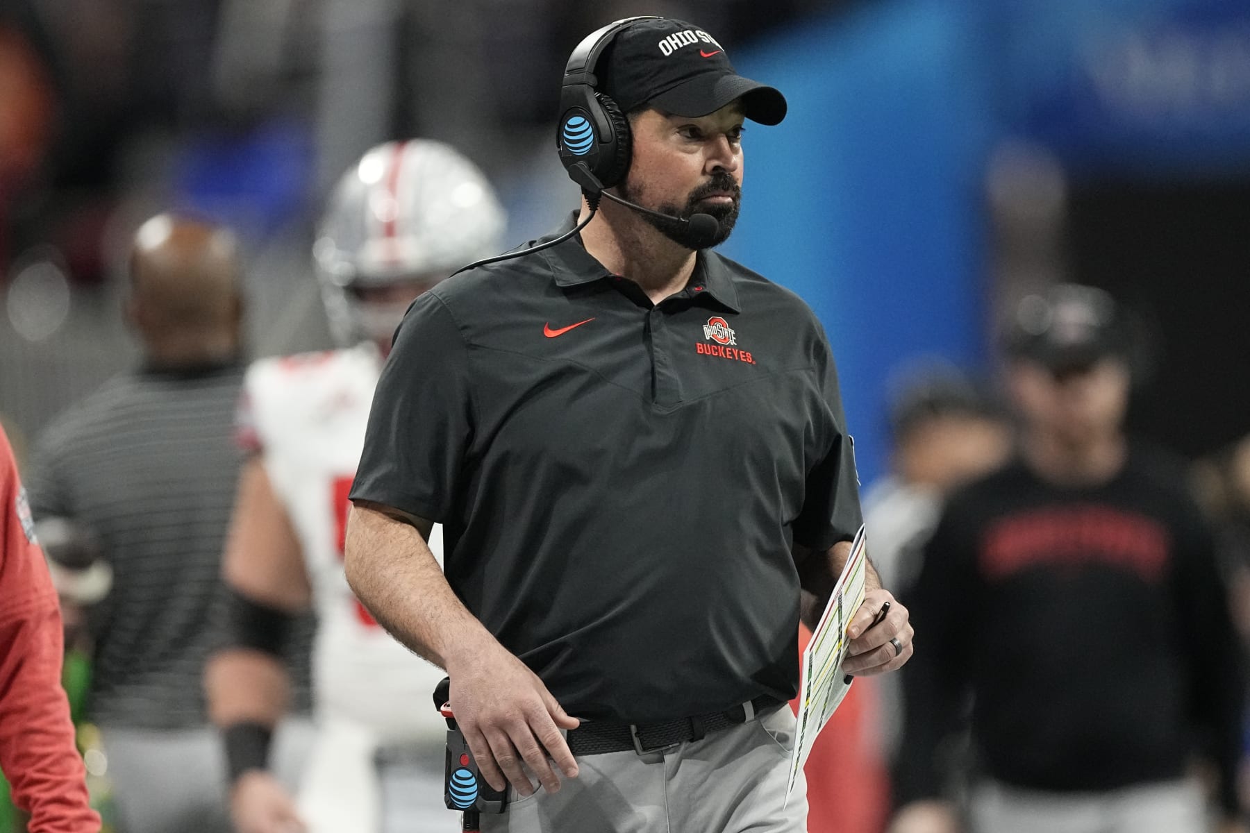 Ohio State head coach Ryan Day walks to the sidelines during the first half of the Peach Bowl NCAA college football semifinal playoff game against Georgia, Saturday, Dec. 31, 2022, in Atlanta. (AP Photo/John Bazemore)