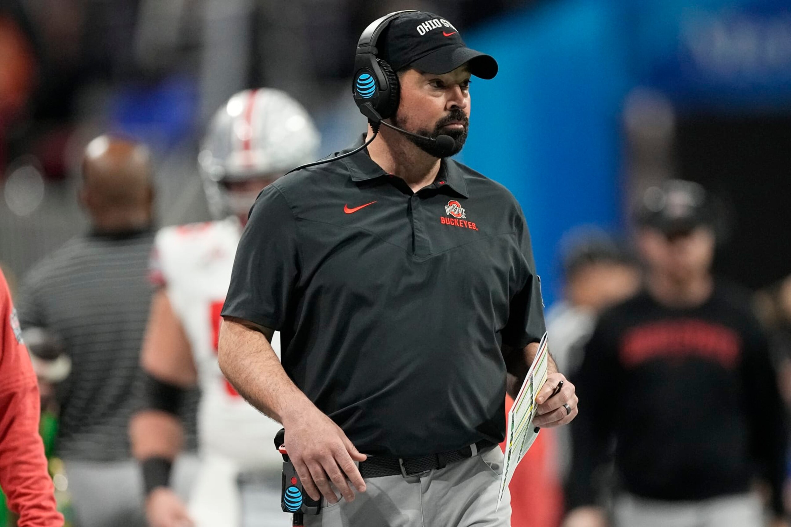 Ohio State head coach Ryan Day walks to the sidelines during the first half of the Peach Bowl NCAA college football semifinal playoff game against Georgia, Saturday, Dec. 31, 2022, in Atlanta. (AP Photo/John Bazemore)