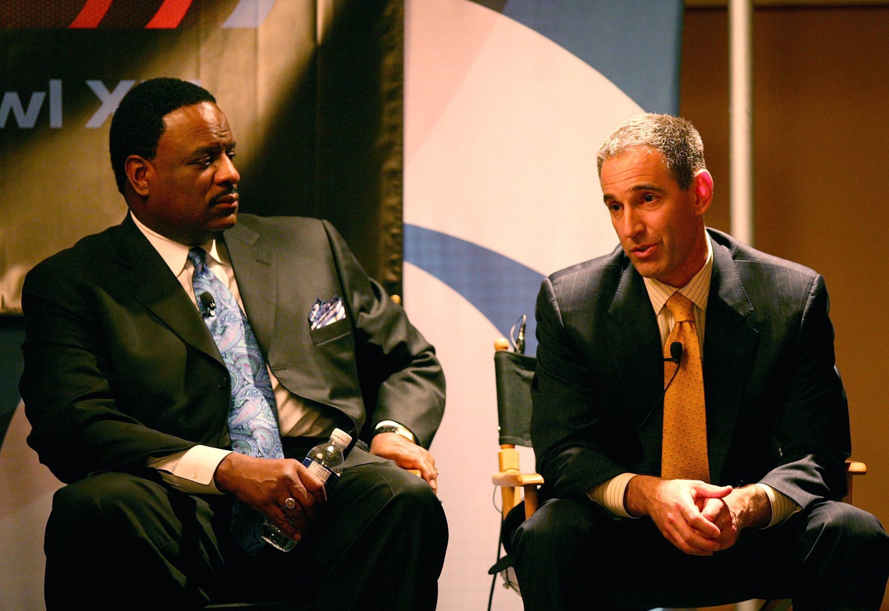 PASADENA, CA - JANUARY 18:  Host James Brown (L) and Executive Vice President/producer Tony Petitti of "NFL Today" speak during the 2007 Winter Television Critics Association Press Tour for CBS at the Ritz-Carlton Huntington Hotel on January 18, 2007 in Pasadena, California.  (Photo by Frederick M. Brown/Getty Images)