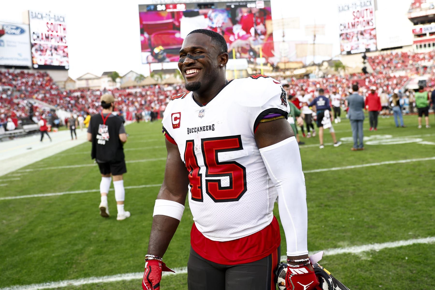 TAMPA, FL - JANUARY 1: Devin White #45 of the Tampa Bay Buccaneers smiles after an NFL football game against the Carolina Panthers at Raymond James Stadium on January 1, 2023 in Tampa, Florida. (Photo by Kevin Sabitus/Getty Images)