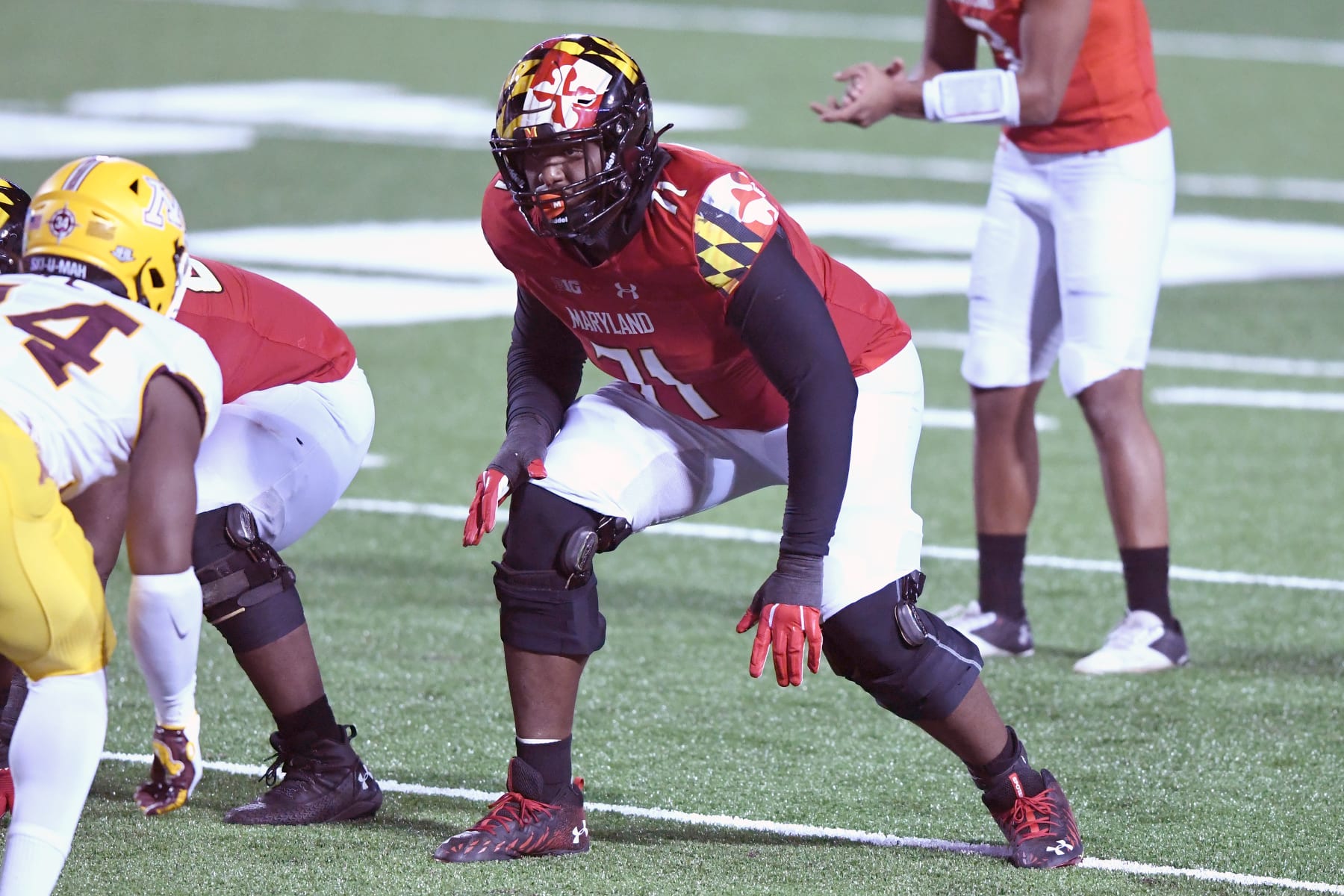 COLLEGE PARK, MD - OCTOBER 30:  Jaelyn Duncan #71 of the Maryland Terrapins in position during a college football game against the Minnesota Golden Gophers on October 30, 2020 at Capital One Field at Maryland Stadium in College Park, Maryland.  (Photo by Mitchell Layton/Getty Images)