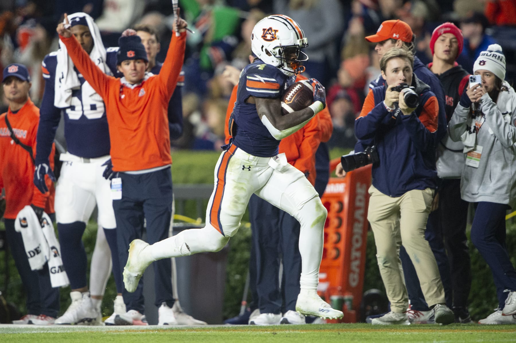 AUBURN, ALABAMA - NOVEMBER 19: Running back Tank Bigsby #4 of the Auburn Tigers runs the ball down the sidelines during the second half of their game against the Western Kentucky Hilltoppers at Jordan-Hare Stadium on November 19, 2022 in Auburn, Alabama. (Photo by Michael Chang/Getty Images)