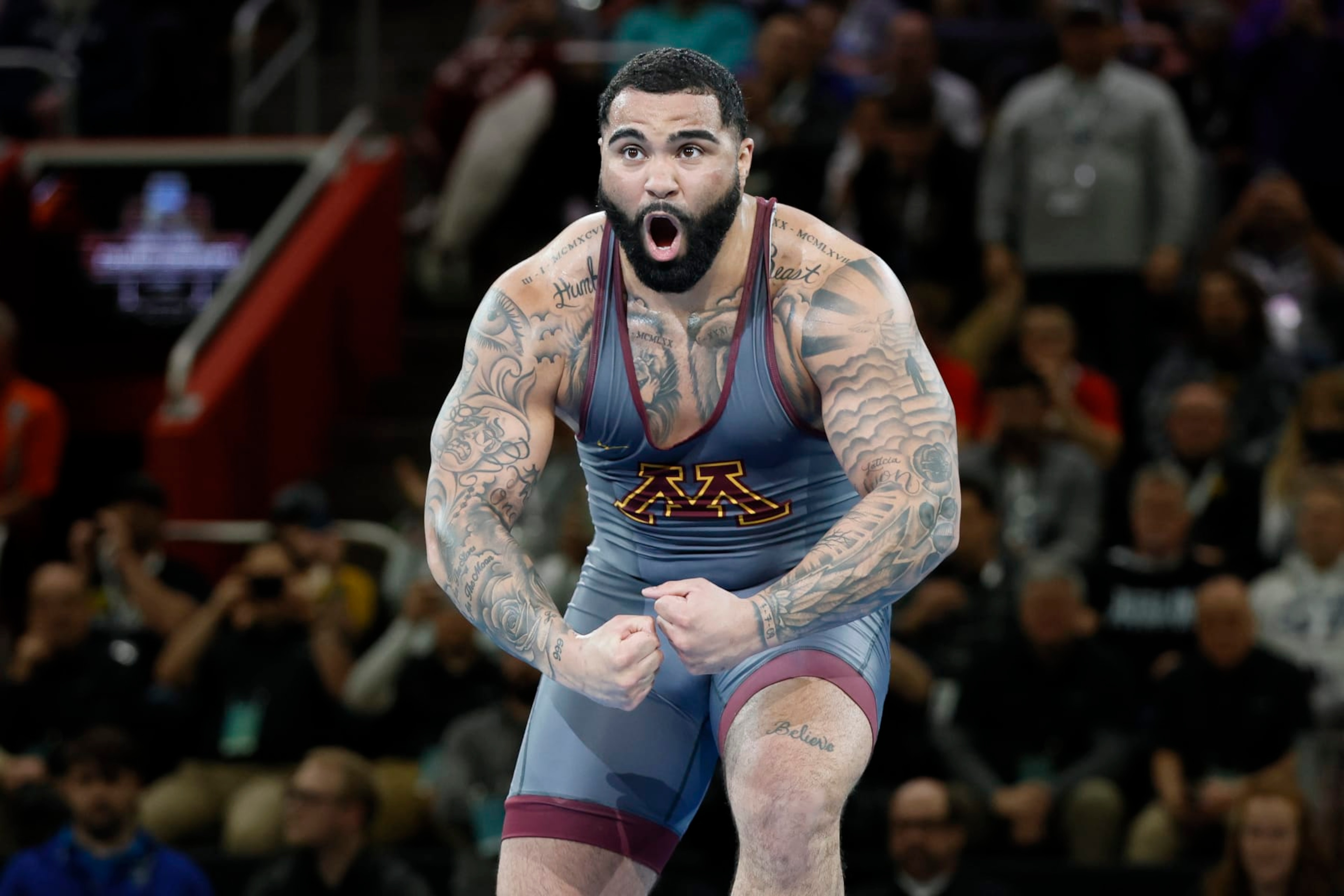DETROIT, MI - MARCH 19: Gable Steveson of the Minnesota Golden Gophers celebrates his win over Cohlton Schultz of the Arizona State Sun Devils in the 285-pound final match during the Division I Mens Wrestling Championship held at Little Caesars Arena on March 19, 2022 in Detroit, Michigan. (Photo by Jay LaPrete/NCAA Photos/NCAA Photos via Getty Images) DETROIT, MI - MARCH 19: Gable Steveson of the Minnesota Golden Gophers celebrates his win over Cohlton Schultz of the Arizona State Sun Devils in the 285-pound final match during the Division I Mens Wrestling Championship held at Little Caesars Arena on March 19, 2022 in Detroit, Michigan. (Photo by Jay LaPrete/NCAA Photos/NCAA Photos via Getty Images)