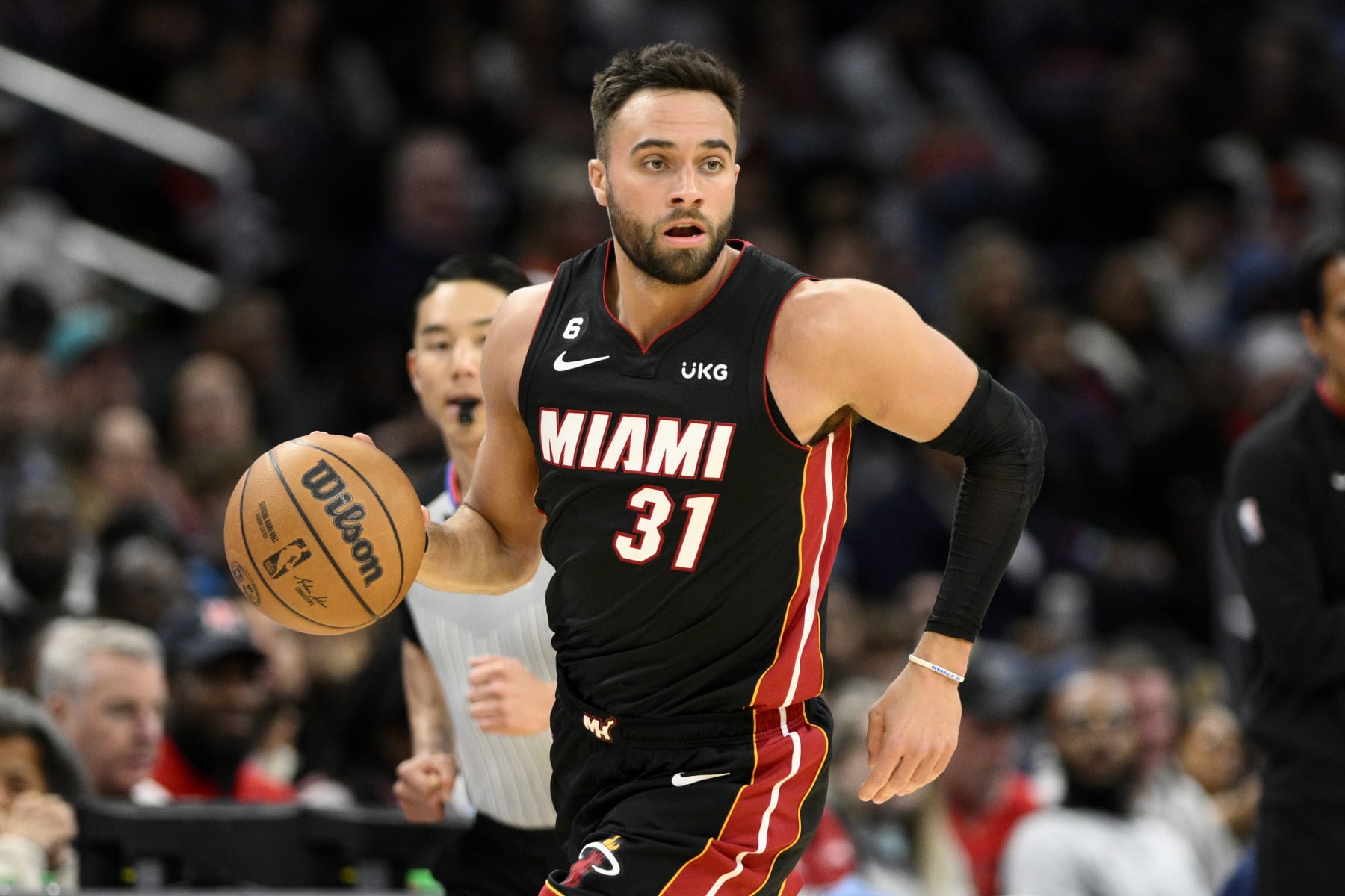 Miami Heat guard Max Strus (31) in action during the second half of an NBA basketball game against the Washington Wizards, Friday, April 7, 2023, in Washington. (AP Photo/Nick Wass)
