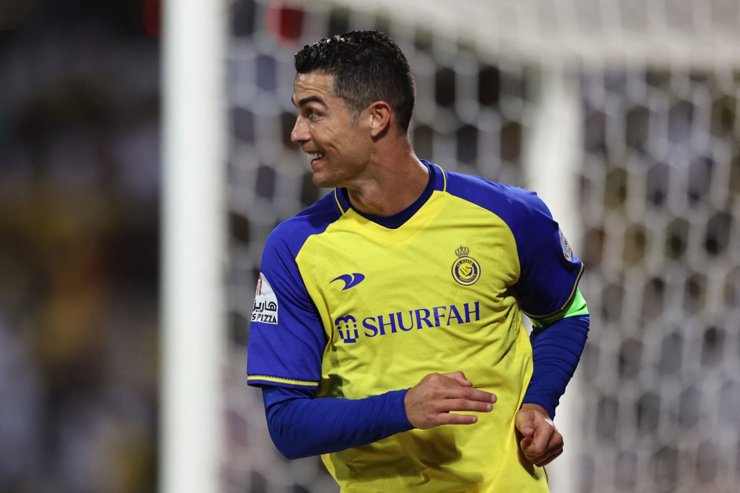 Nassr's Portuguese forward Cristiano Ronaldo celebrates scoring his team's second goal during the Saudi Pro League football match between Al-Wehda and Al-Nassr at the King Abdulaziz Stadium in Mecca on February 9, 2023. (Photo by AFP) (Photo by -/AFP via Getty Images)