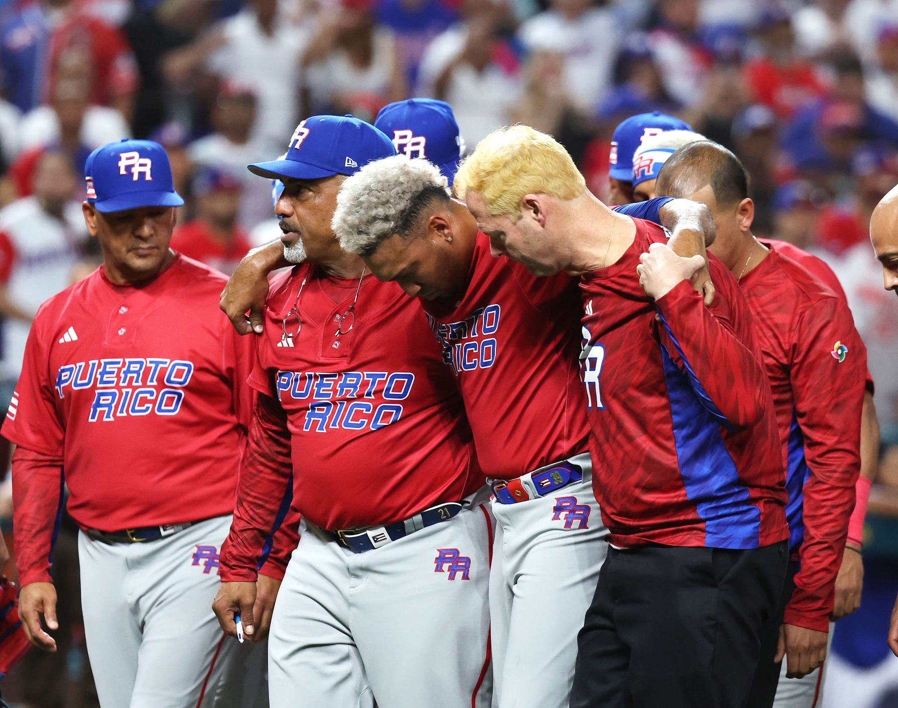 MIAMI, FLORIDA - MARCH 15:  Edwin Diaz #39 of Team Puerto Rico is carried off the field after sustaining an injury while celebrating a 5-2 win against Team Dominican Republic during their World Baseball Classic Pool D game at loanDepot park on March 15, 2023 in Miami, Florida. (Photo by Al Bello/Getty Images)