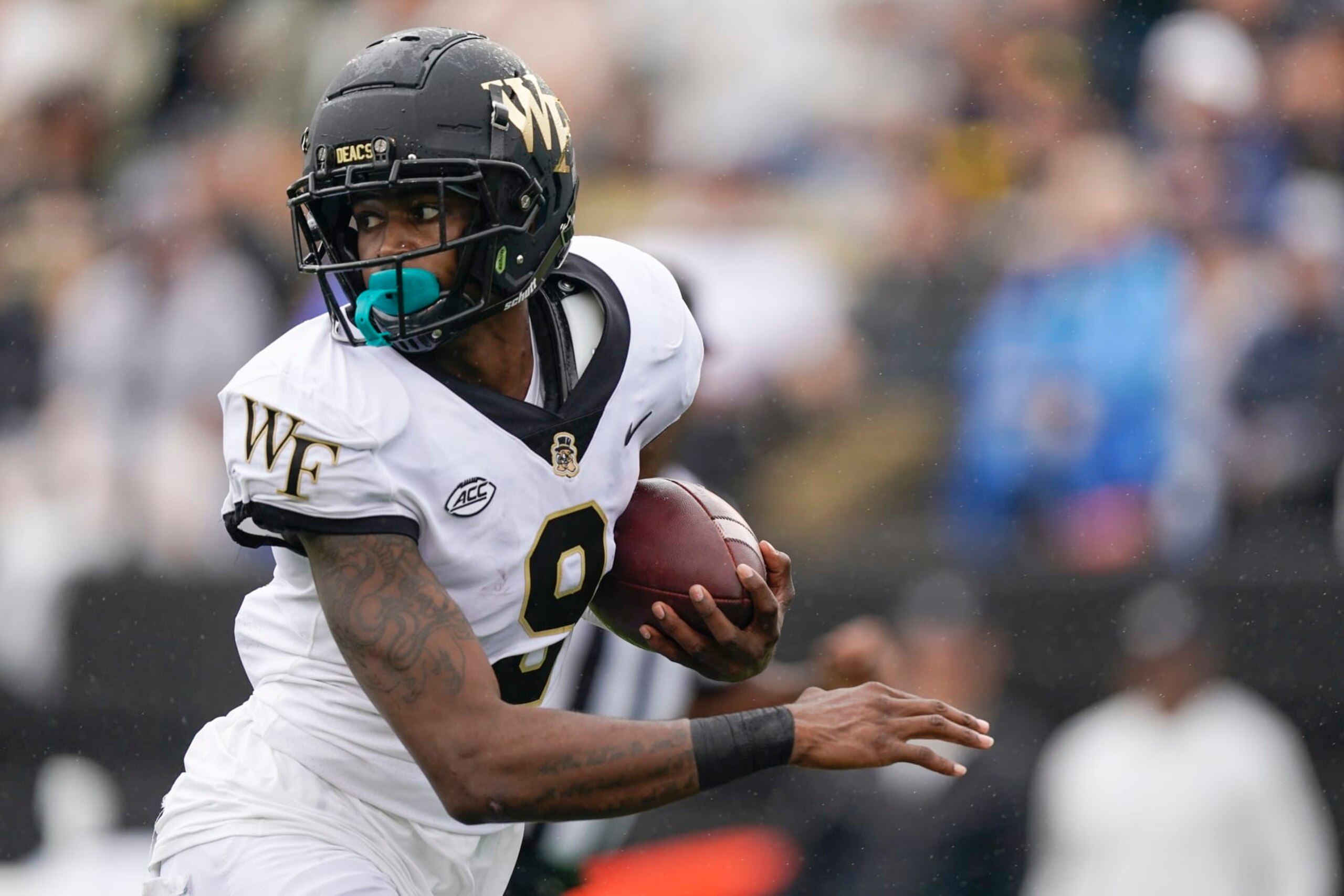 Wake Forest wide receiver A.T. Perry looks back for defenders as he runs to the end zone on a 68-yard touchdown pass play against Vanderbilt in the first half of an NCAA college football game Saturday, Sept. 10, 2022, in Nashville, Tenn. (AP Photo/Mark Humphrey)