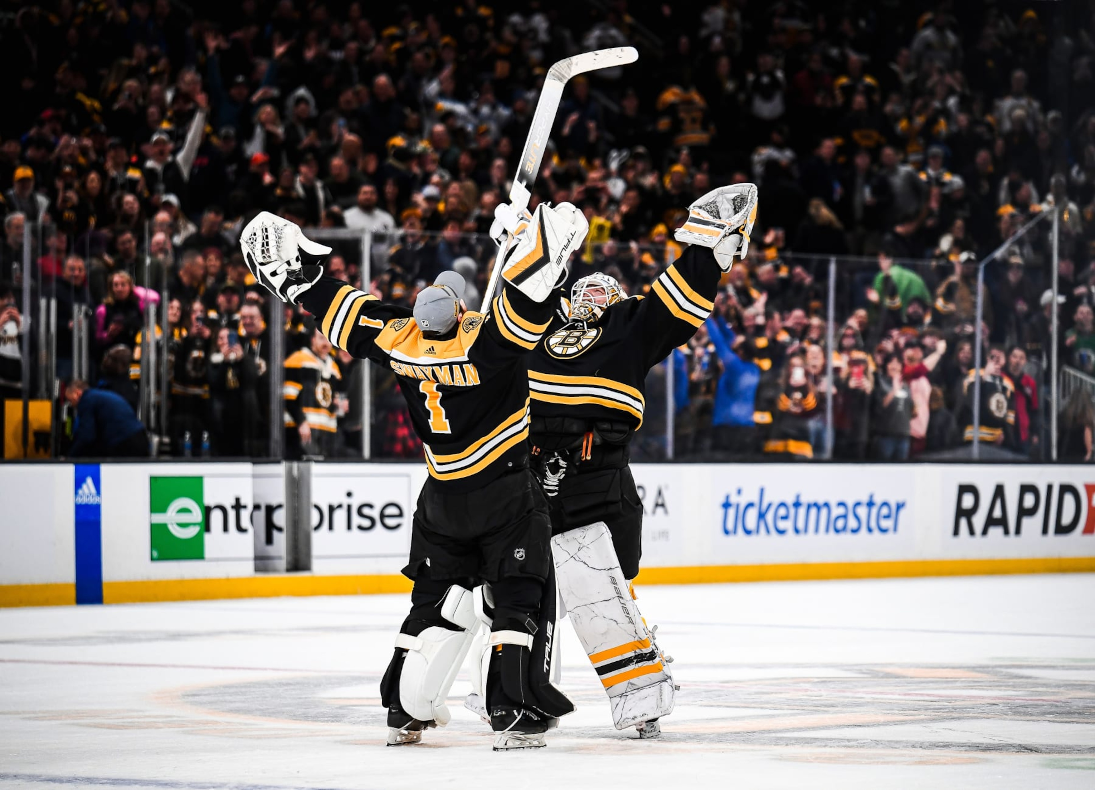 BOSTON, MASSACHUSETTS - MARCH 30: Jeremy Swayman #1 and Linus Ullmark #35 of the Boston Bruins celebrate an overtime win against the Columbus Blue Jackets at TD Garden on March 30, 2023 in Boston, Massachusetts. (Photo by China Wong/NHLI via Getty Images) BOSTON, MASSACHUSETTS - MARCH 30: Jeremy Swayman #1 and Linus Ullmark #35 of the Boston Bruins celebrate an overtime win against the Columbus Blue Jackets at TD Garden on March 30, 2023 in Boston, Massachusetts. (Photo by China Wong/NHLI via Getty Images)